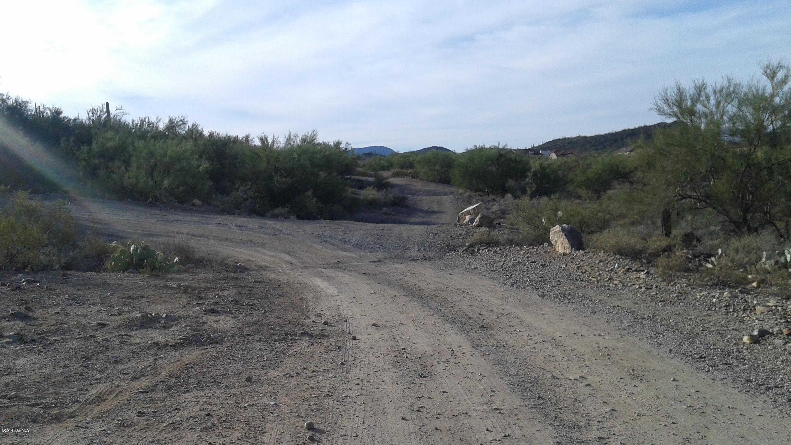 Come see this lovely property sandwiched between Tucson Estates and a beautiful rock formation! Seller is prepared to negotiate.