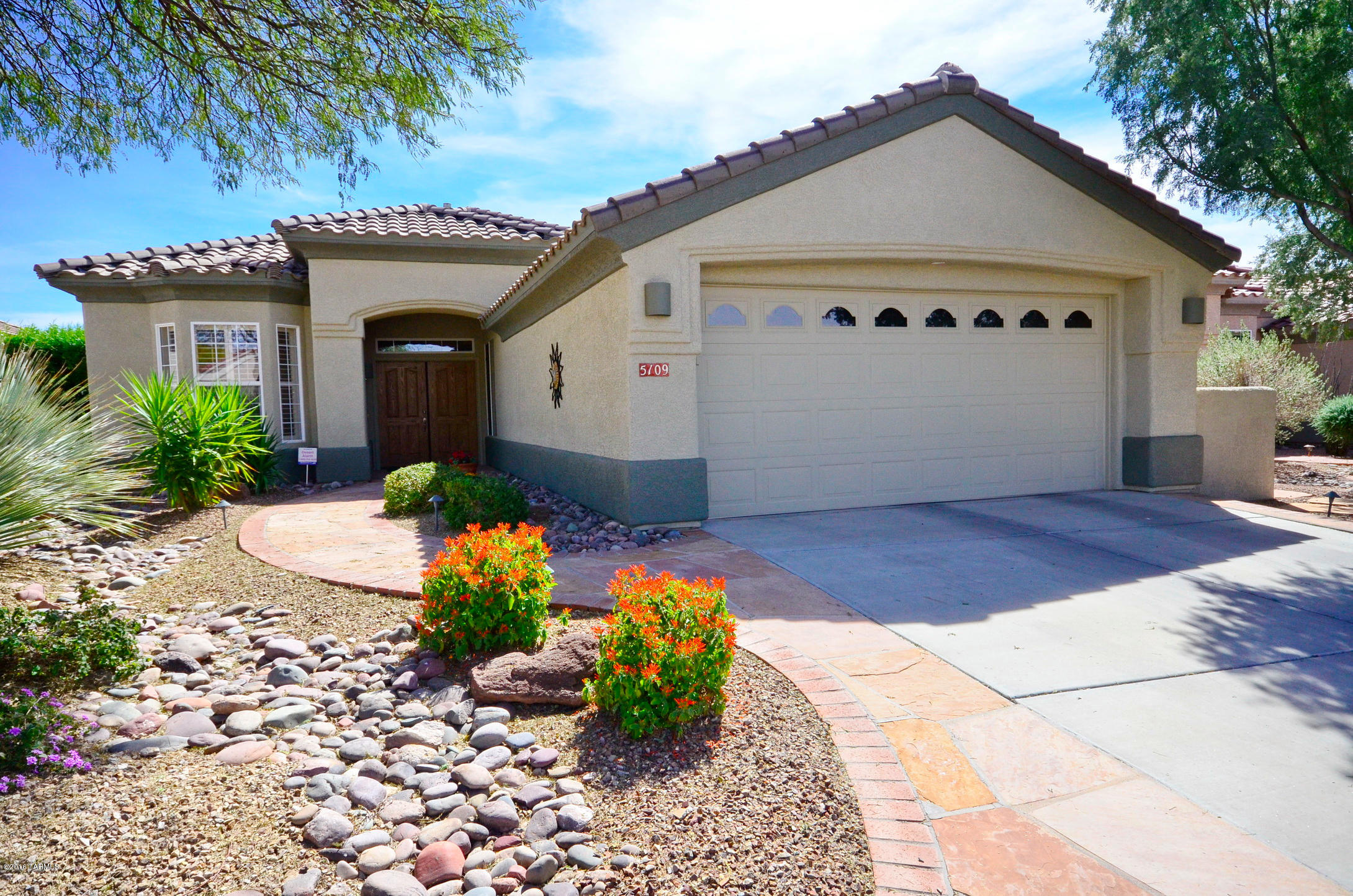 Brand New A/C & Furnace ! Beautiful mountain views from a relaxing rear porch and patio - enjoy soft waterfall sounds. Popular Hillsboro model with extended den/office and extended laundry room & 3 bay windows.  Inviting double front door entry - soft desert paint colors.  Plantation shutters throughout home.  Surround sound speaker system. Exterior painted in spring of 2015. New hot water tank in 2014 - recirculating pump installed for constant ready hot water. Reverse osmosis at kitchen sink. All kitchen and laundry room appliances included with accepted offer. New Bosch dishwasher in 2015. The oversized extended den/office and the extended laundry room with abundant cabinets make this Hillsboro a most highly desired home. Majority of furnishings are available on separate bill of sale