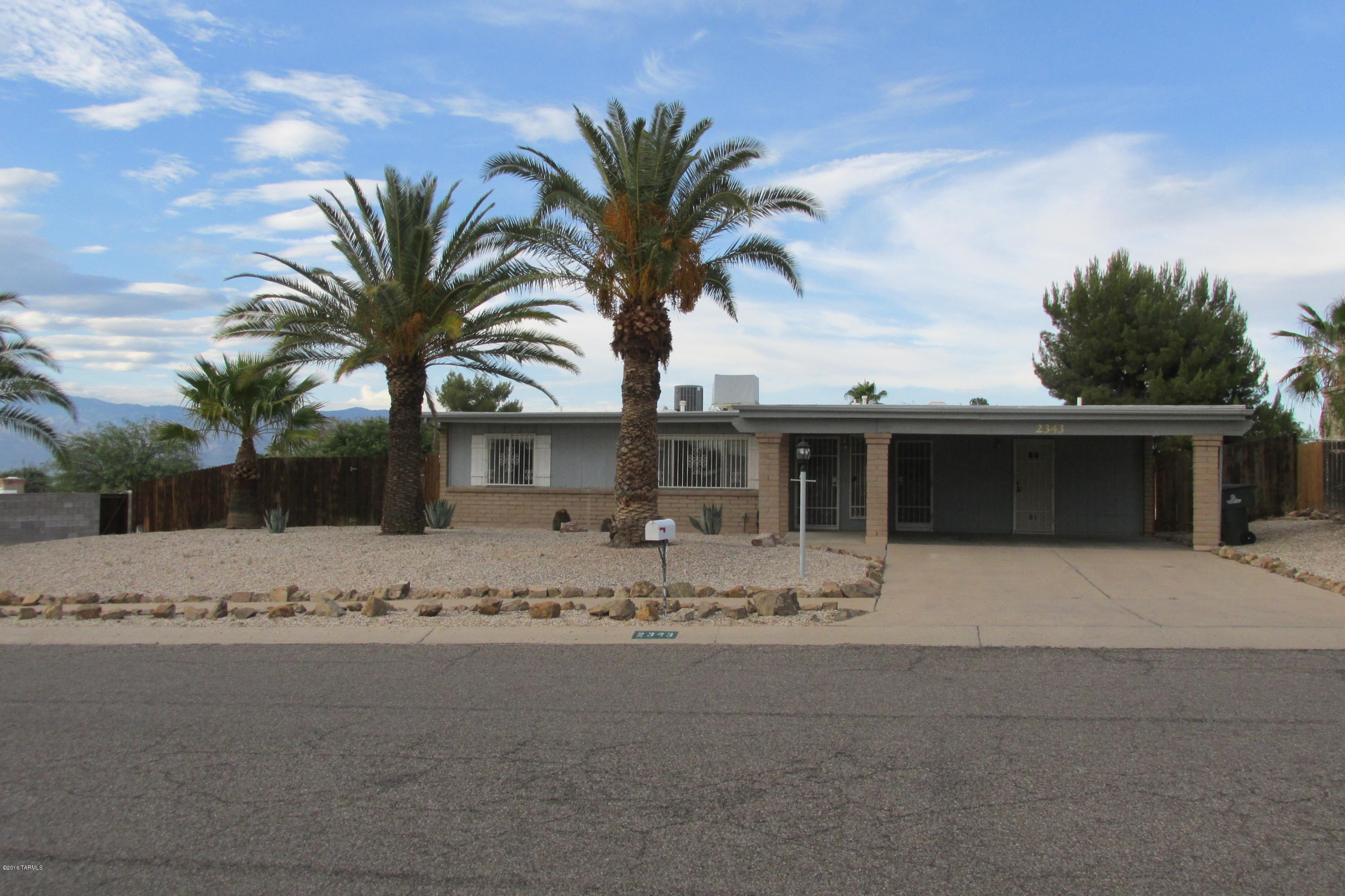 This is a lovely, move in ready,3 bedroom, 2 bath home that is clean as a whistle. A pretty place on a very nice street.  Manicured lovingly front & back. Wheelchair accessible front & back doors. Entry has little bookshelf or small desk cove. Nice size living room and family room. Fans(5)throughout. Sweet kitchen, light & bright,eating bar, pantry closet,good carpet,split bedroom plan, vertical blinds. Master has walk-in closet, 3/4 bath. Full bath has like- new tile. Laundry room, extra cabinets. Wrought iron dresses up the home. Great use of space. Must see this dollhouse.