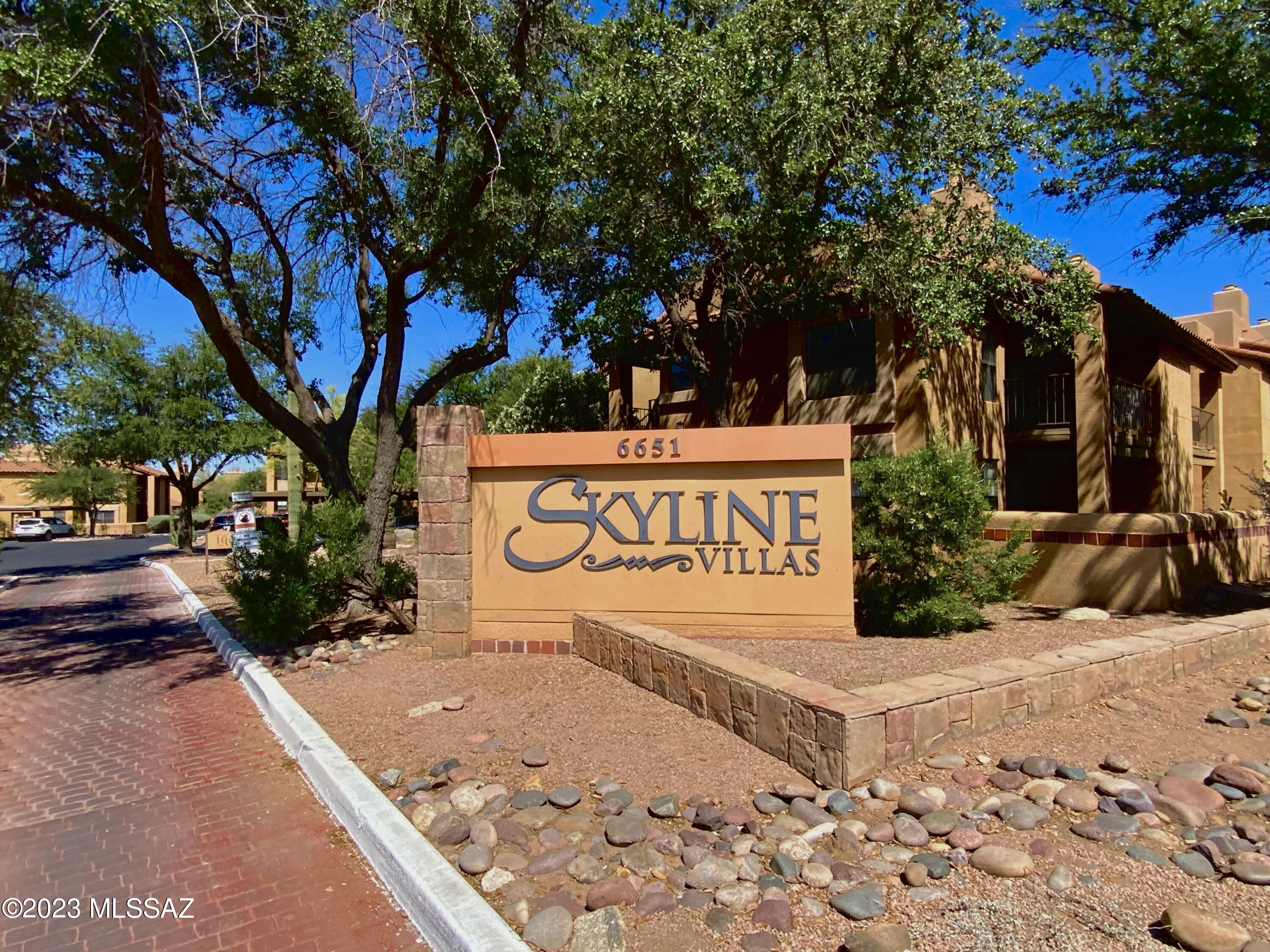LOCATION, LOCATION, LOCATION! This 2BD/1BA/1st floor condo checks all your boxes! It has views of the Catalinas, is immaculately kept , and boasts LOTS of light. The manicured gounds are outside your back door. You are within walking distance to La Encantada where there is shopping, restaurants and of course, AJ's!! You have tennis, pool, spa and a clubhouse to enjoy. You even have a covered parking space. All this and priced right! Come see for yourself!