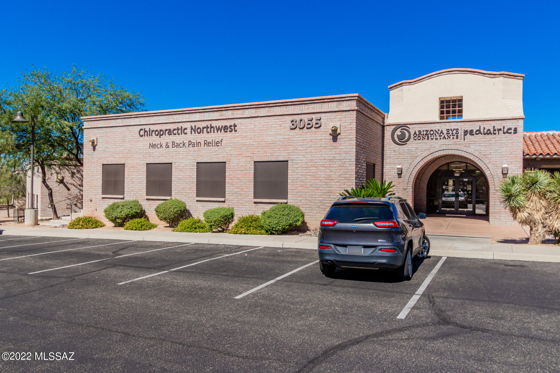 Beautifully updated move in ready professional office.  Wood plank tile throughout, exceptional reception area with granite countertops, multiple offices, break room with washer/dryer hookup, sink, small refrigerator. Restroom for clients and second for staff.
 Pre-piped for medical use. Currently used as Chiropractor Office.