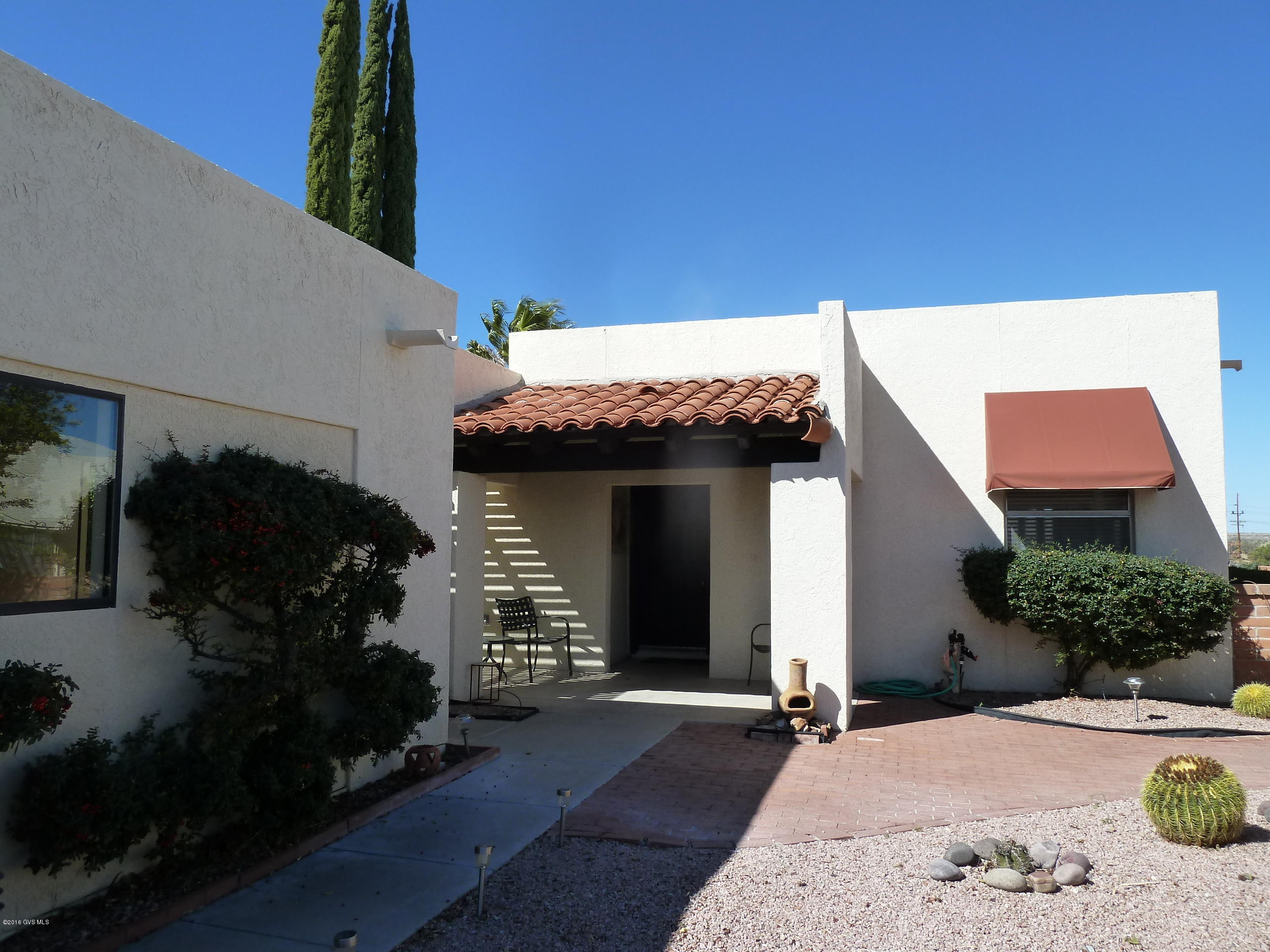Lovely move-in ready townhome with lots of great features. There are sliding doors leading to the back patio from the living room, guest bedroom as well as the master bedroom. The master bedroom has tile flooring and there is an office/den off the master. There is a huge pantry closet across from the kitchen which can be used for a pantry or small office or both. Lots of storage including a room in the garage for storage. Enjoy the mountain view from the back patio.