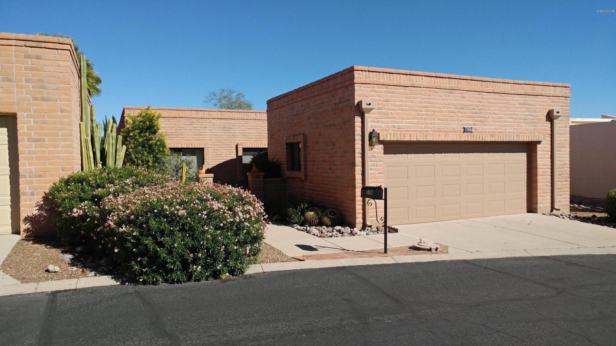 Very popular Ensenada model, 1750 sq. ft
Large kitchen with garden window, two bedrooms, den, wet bar, kiva fireplace, large back and side yard with beautiful plantings. Extended garage with built in cabinets and wash sink .Borders common area with walking trail and lots of trees.