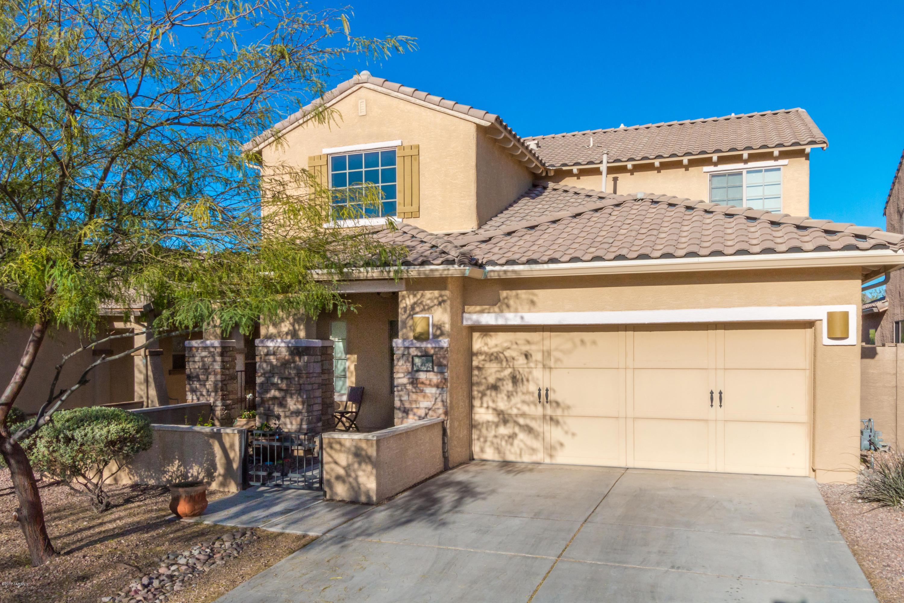 This lovely 2795 sf home includes a front courtyard w/ covered patio, 4 BD / 2.5 BA & bonus room. Backing to open space, you can enjoy mountain & sunset views from inside & outside the home. As you enter, note the soaring living room ceiling, elegant staircase w/iron railing leading to the upstairs landing surrounded by 3 sizeable bedrooms & full bath. The convenient eat-in kitchen features granite counters, an abundance of maple cabinetry, an island & stainless appliances. The main-floor master suite features executive height dual vanity, walk-in shower, garden tub & spacious walk-in closet. Large family room opens to the backyard & rear covered patio. A community park is located just down the street & includes playground, swings, basketball court & large grassy play area.