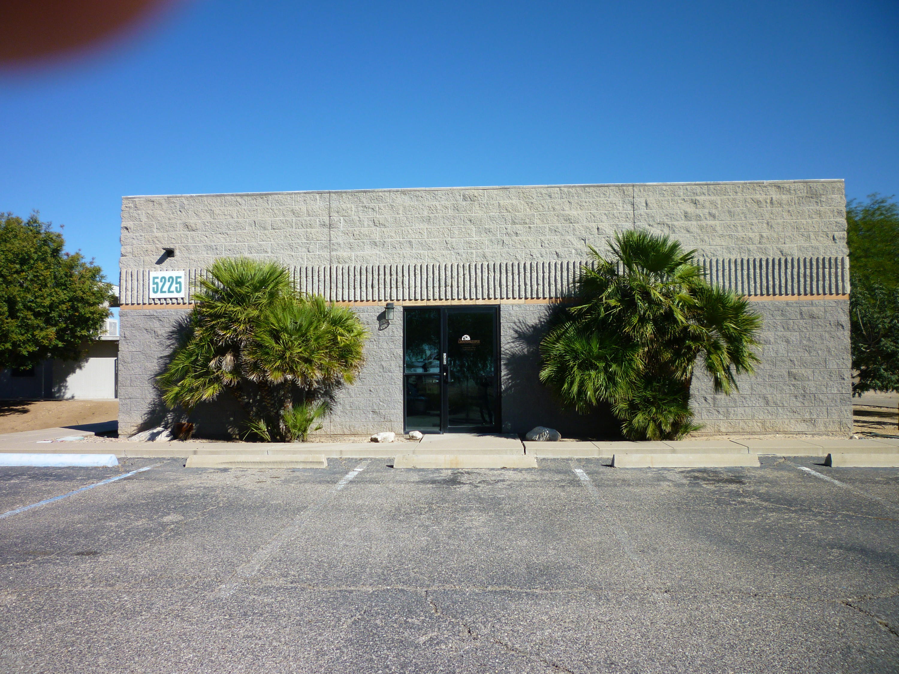 Former Groundskeeper Office Facility containing 5,226 square feet on 2.02 acres zoned CI-1 (Light Industrial Warehouse Zone). 2 separate buildings: 1) Office building is 3,600 sf and 2) Warehouse/Shop building is 1,626 sf. Entire parcel is fenced and Paved. This property also includes tax parcel # 140-01-0210. Located close to I-10 in the Southeast Industrial sub-market minutes away from Tucson International Airport.