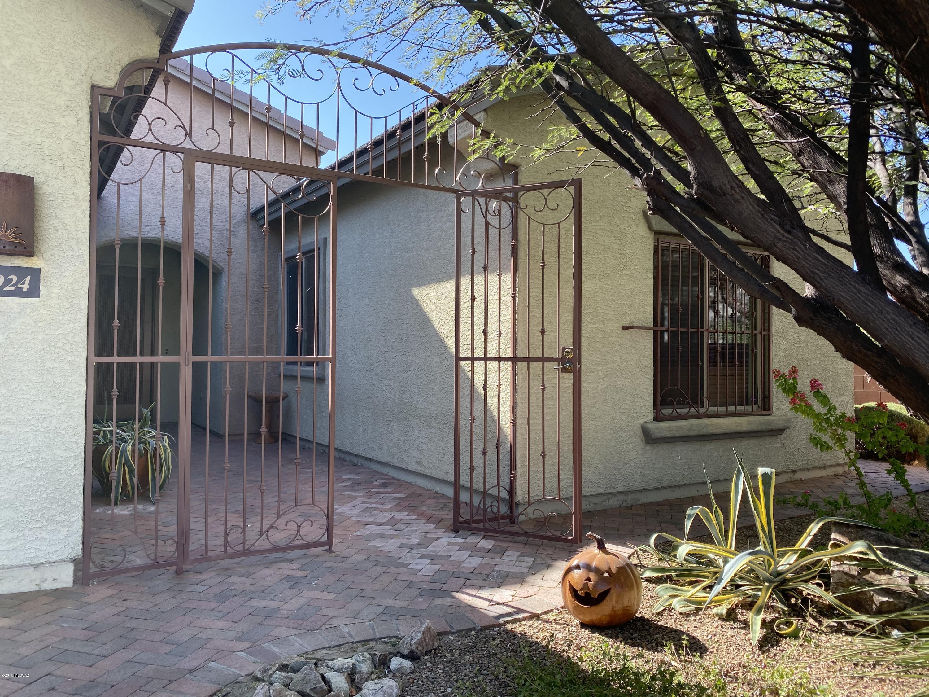 Located in sought after Desert Enclave- tucked away Meritage neighborhood close to Case Park, shopping and restaurants. This beautiful home has everything a buyer could want- welcoming courtyard entry, chef's kitchen with high end appliances, breakfast nook and island with breakfast bar, spacious family room with built in entertainment center, plantation shutters throughout home, spacious garage with 3rd car tandem, tile in all the wet areas and brand new carpet throughout. Master bedroom has it's own entry to the covered rear porch which leads to extended outdoor living space including pergola, outdoor kitchen and gunite pool! Large lot with no rear neighbor and gorgeous mountain view. Homes in this neighborhood don't come up for sale often- come take a look!!