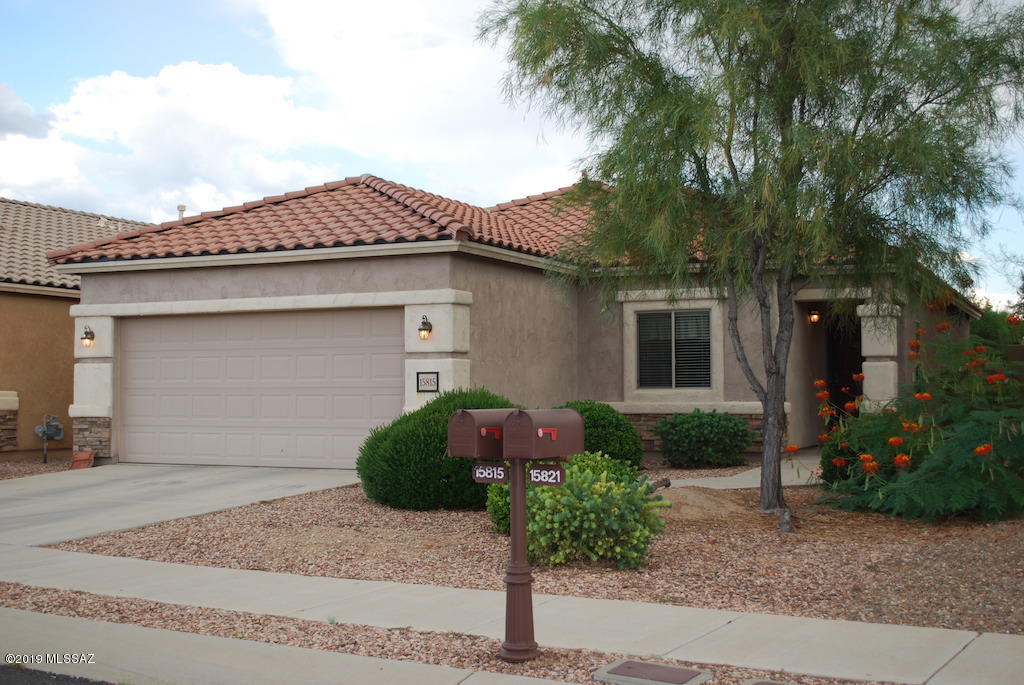 Gated Rancho Sahuarita 55+ Community Home. 2 Bed 2 Baths + Den,  1594 SQ FT on a view lot and part of the Gated Rancho Resort Community. Spacious great room floor plan. Tile floors in all living areas, carpet in bedrooms. Eat in Kitchen looks into living area and has maple cabinets and island. Master Suite has dual closets, dual sink vanity and walk in shower. Ceiling fans in all rooms. Full size washer/dryer. Extra long garage comes with storage and workbench. Community comes with pool and spa, tennis courts, bocce courts and clubhouse. This home is offered as NON-SMOKING. Tenants must be 55+ as per community age restrictions. Pets subject to owner approval.