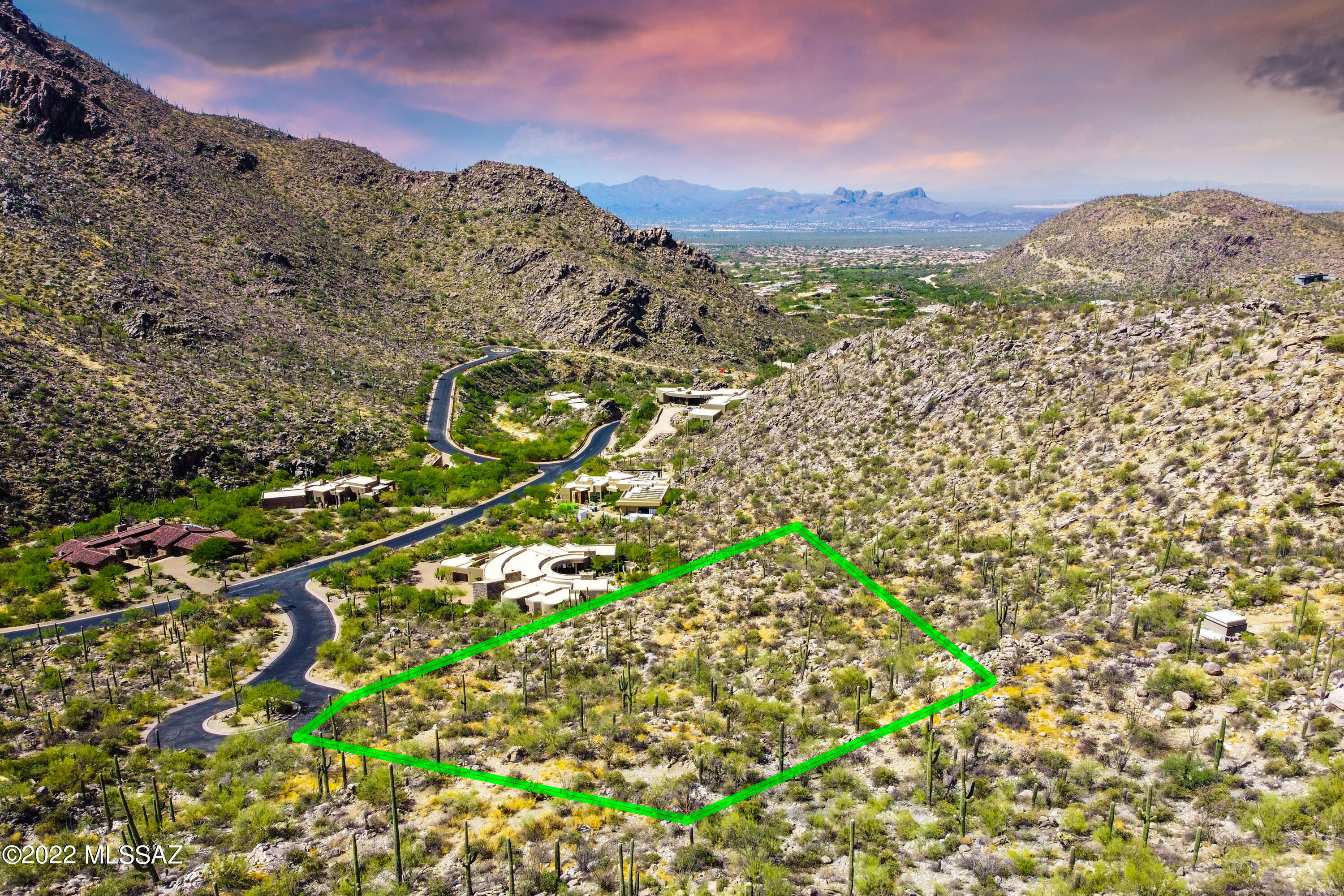 Beautiful saguaro studded 2.12 acre lot located in prestigious Canyon Pass, an exclusive private gated-community within Dove Mountain. This stunning lot sits at the very end of a cul-de-sac with excellent privacy. Enjoy some of the most spectacular mountain views that the Sonoran desert has to offer from this lush and picturesque homesite. This manned-gated, quiet, and serene community has every luxury amenity nearby - multiple golf course options including The Gallery Golf Club, multiple dining options, hiking, biking, and the world-renowned Ritz-Carlton Resort next door. All of this in the flourishing Dove Mountain community. Listing photo features a potential concept for this lot. Come and build your dream home on this ideal homesite!