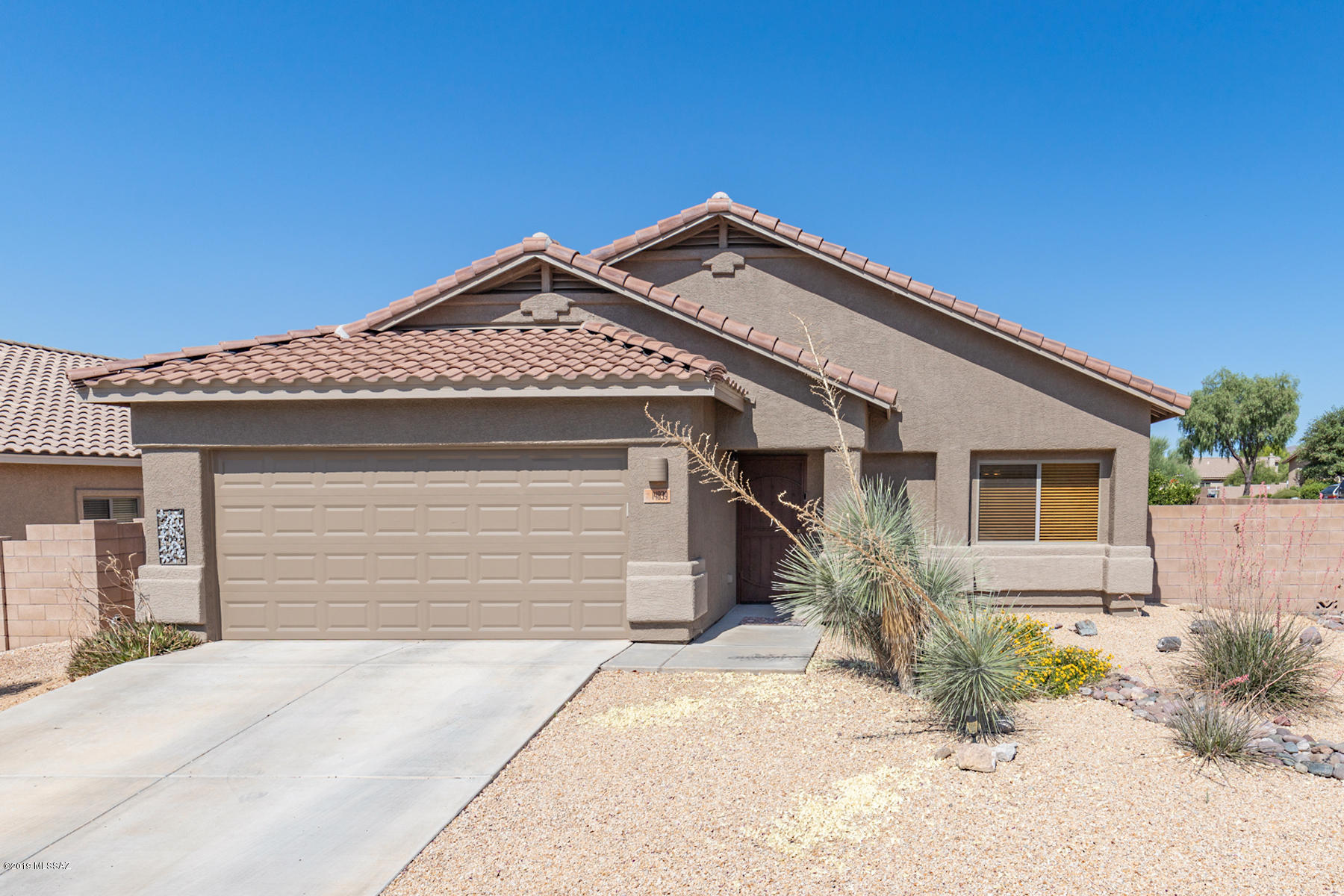 Located on an interior corner lot on a cul-de-sac street w/Mountain Views, this 3BD/2BA, 2-Car garage home is ready for a new family. As you enter, you will feel the comfort of home. The living room adjoins the family room. A breakfast bar separates the kitchen and family room. Convenient kitchen includes Kenmore Black Stainless 3 door fridge, gas oven/stove, dishwasher & microwave new 2/2019. The family room opens to a private covered and expanded rear covered patio. Expanded master suite includes walk-in closet, spa tub/shower. The laundry room includes black stainless ''mother load'' Kenmore Elite Washer & Dryer new 2/2019. Recently painted interior and exterior. This community includes a park and is convenient to schools, shopping, dining and other necessities.