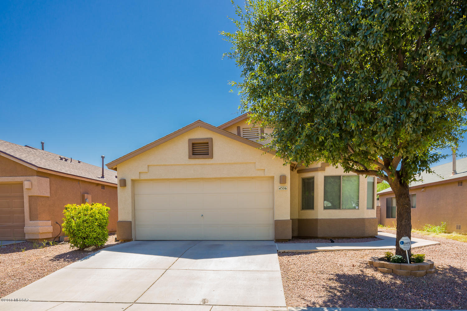 Super fresh move-in ready home! Stained concrete floors throughout- NO carpet. Bright, open floor plan with plenty of room for entertaining, kitchen island, and vaulted ceilings. Nicely done yard, with tons of shade, pavers, planters, and turf! Make this home yours today.