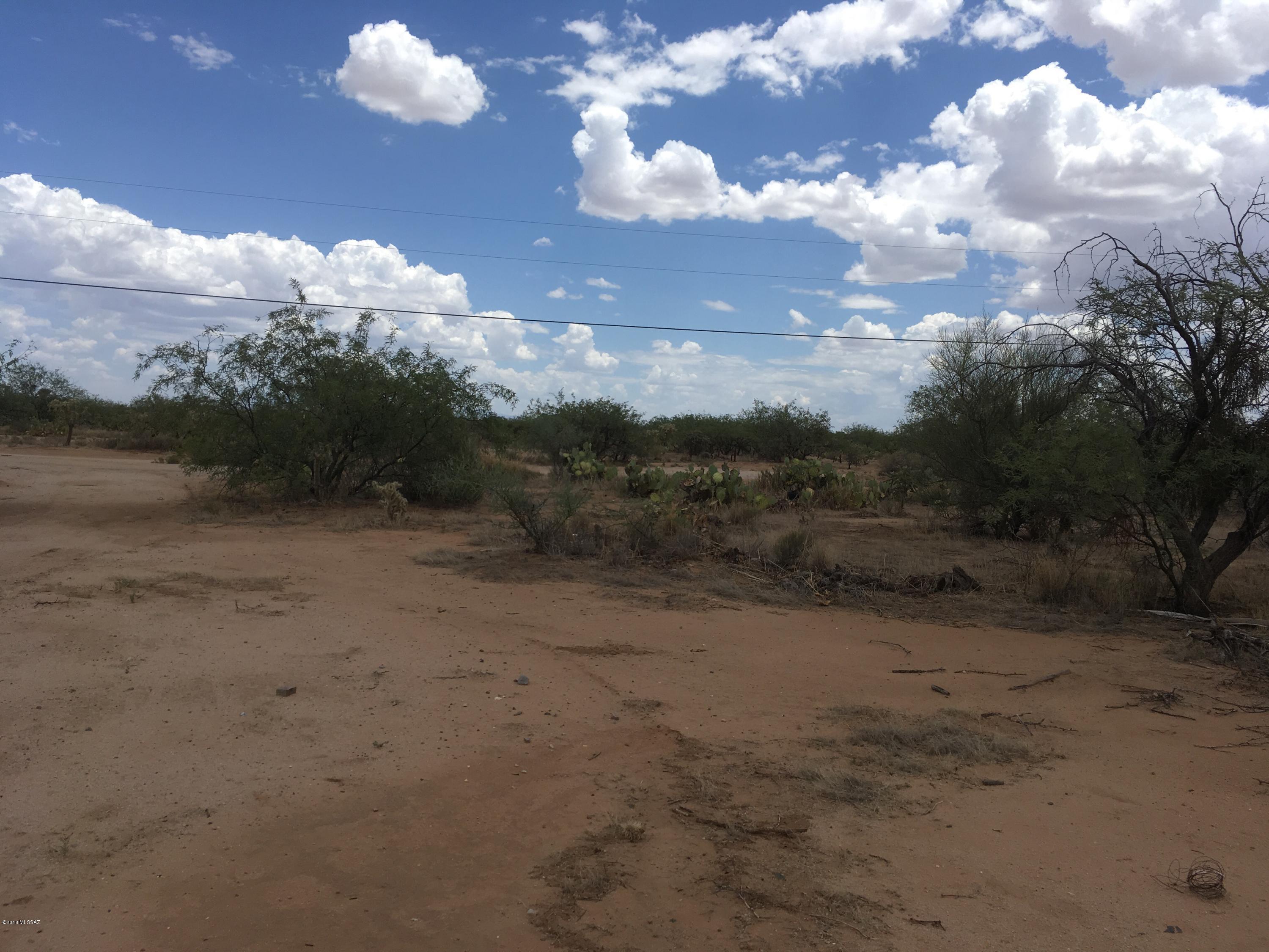 Level lot with utilities - former site of mobile/manufactured home - hook ups may be dated but they're there.  Level homesite.