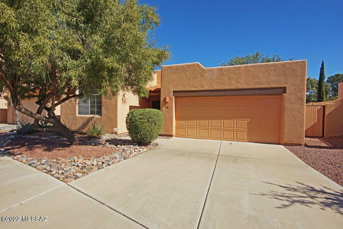 Great Central townhome in Cactus Allen Estates. 3 Bedroom and 2 bath. Great Lot. Short distance to Tucson Racquet Club.