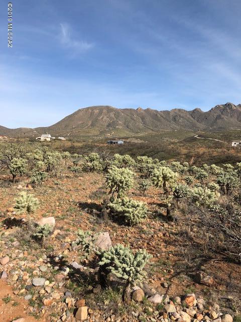 Residential lot with great mountain views, only about 6 minutes from the Interstate.  Short amount of dirt road.  Electric and water appear to be at the street but water should be verified during the inspection period.  Has a passing percolation test and the lot has been staked and flagged.