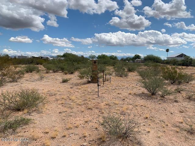 Affordable 1 acre lot on a paved, maintained road. Utilities at lot line and an easy building site with great mountain views.