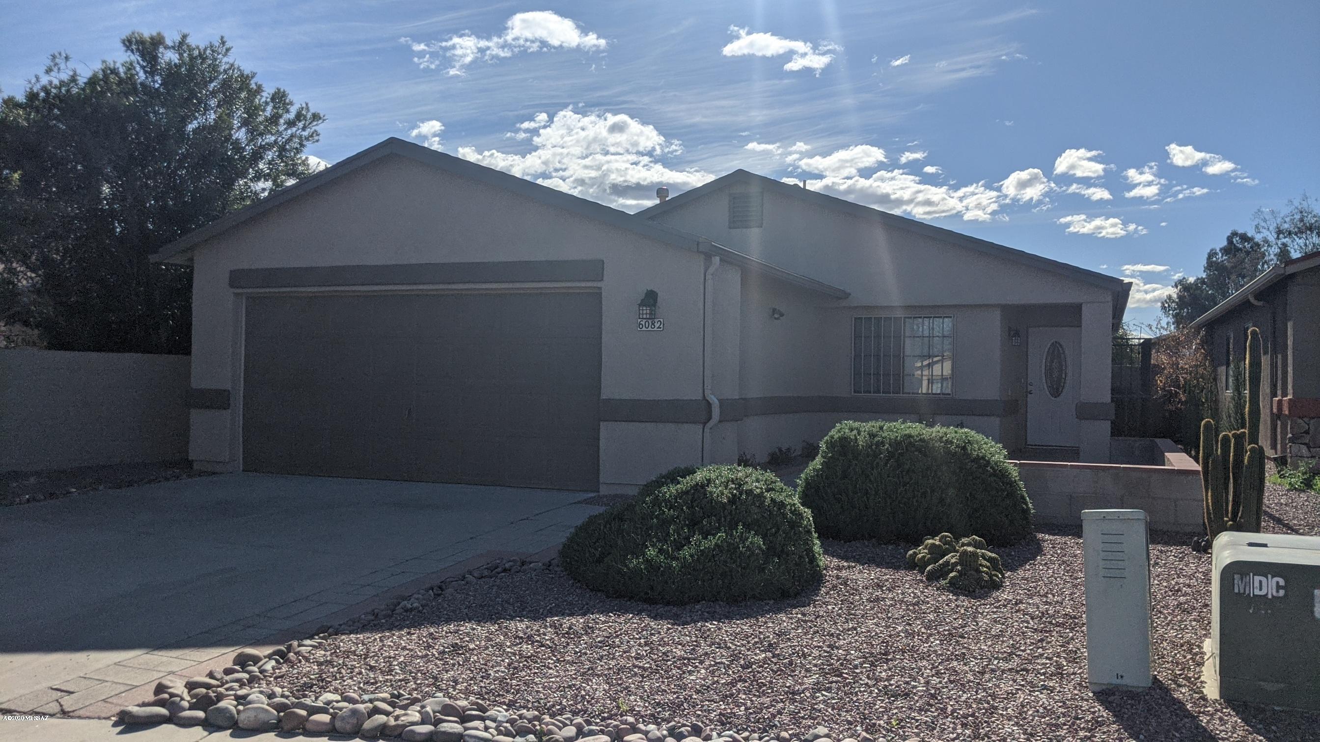 Beautifully remodeled home in well established Midvale Park. Fresh paint inside and out, all new landscaping front/rear, completely remodeled and updated kitchen and bathrooms, new ceramic tile throughout, all new appliances, water heater, updated wiring for wall mounted tv's, too much to list, close to schools, shopping, and I-10 for easy access to all of Tucson. A Must see for sure.