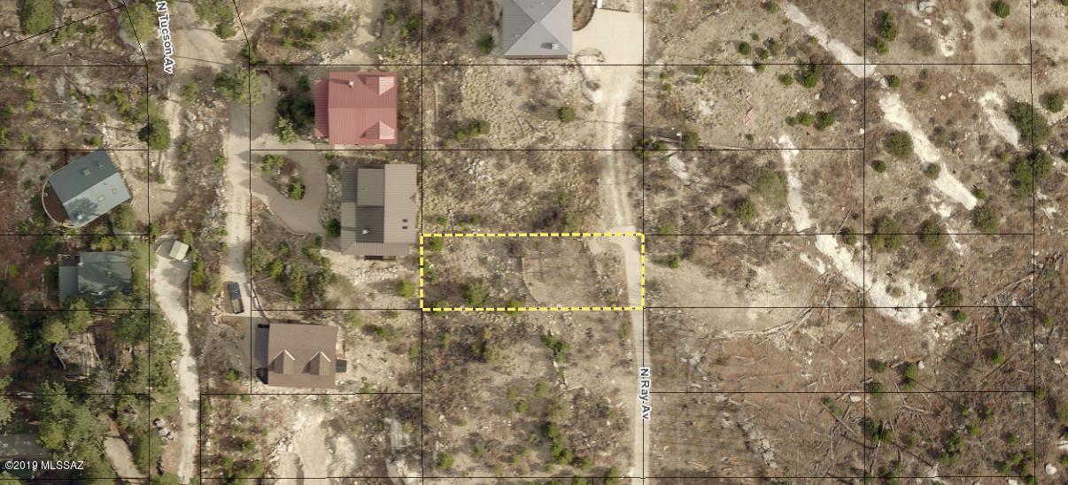 Nice lot in a treed area with a flat portion of where your dream cabin can go. Needs a septic. 5641 sq ft