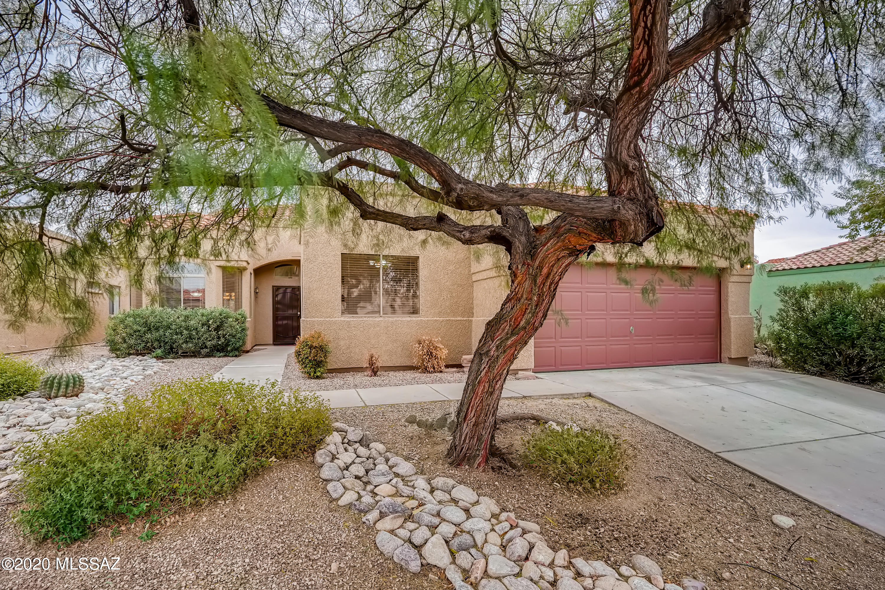 Step inside of this stunning 4 bedroom, 3 bathroom home with a den, mountain views, and updated interior features. Upon entry, you'll discover high ceilings and chic tile flooring, and welcoming natural light. Cooking and preparing meals in this kitchen will be a delight with the stainless steel appliances, pantry for storage, and breakfast bar for easy serving. Escape to the primary bedroom where you'll enjoy a walk-in closet, hardwood floors, and an en suite bathroom with double vanity sinks! In addition to the bedrooms, there's a den that would make a perfect home office or library. The spacious backyard patio will quickly become your favorite place to entertain friends or family on the weekends! This home is located in a quiet neighborhood near good schools, parks, dining, and I-10.