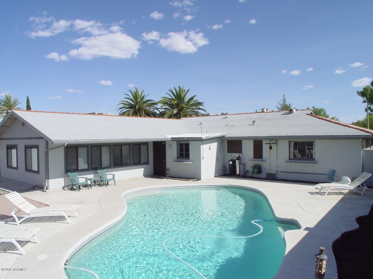 Beautiful and spacious 4 BR home with a private , sparkling, pool. Ceramic tile thru out, open floor plan with spacious bonus room, large enough for a pool table.  Fireplace and all appliances including washer/dryer included.  Pool service included in the rental amount.