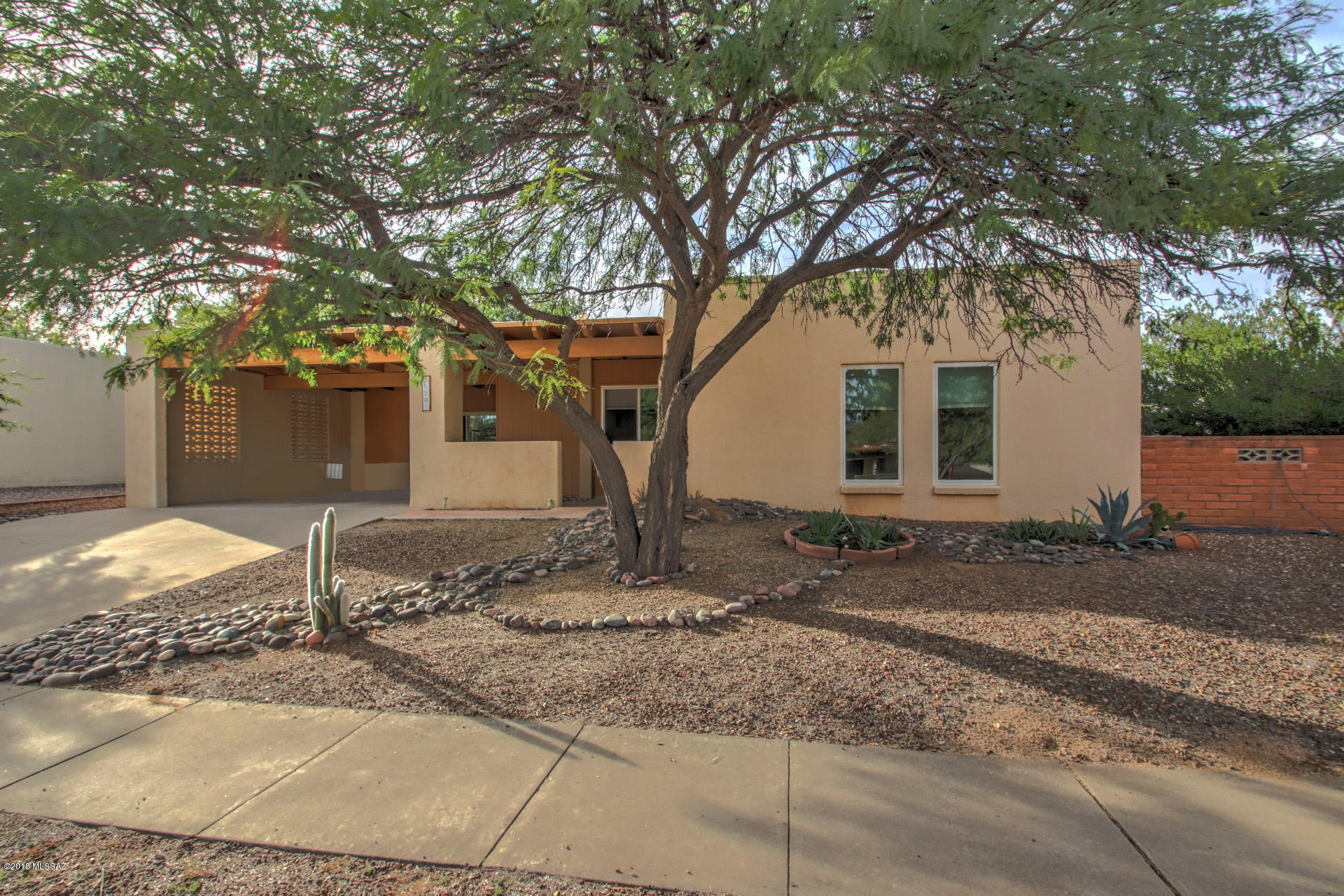 Ready, set, go!  Go take a look at this delightful free standing home priced at the low end for homes on the market here in Green Valley.  Desired amenities include the living rm with large window to let in the light ,  kitchen with pass through to the formal dining area. A huge Bonus rm offers space to use for your hobbies, or use it as your family gathering place. . The bonus room also offers direct access to the back yard and has abundant storage.  This popular floor plan features large bedrooms and the owners suite boasts a large walk in closet. Outside you can enjoy the relaxing back yard that offers shade and atmosphere from the large trees, or relax on the front porch. And yes, it has a laundry room and a 2 car carport! Not much in this price range so take a look before it's gone.