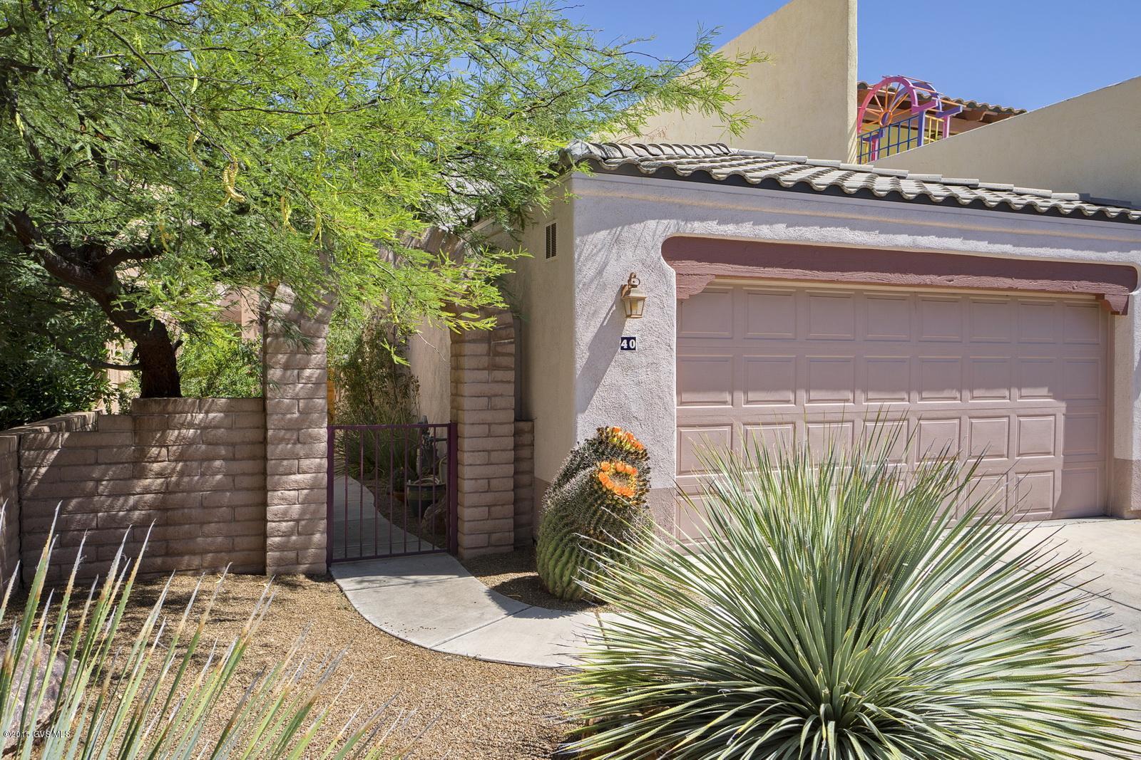 Cielito Lindo 2 bedroom, 2 bath Townhome in Barrio de Tubac. Large kitchen with breakfast area. Living/dining room with gas-log fireplace and sliding room door opening to patio. Patio looks at archaeological preserved desert view! Extra room off kitchen for study/office. Smaller second patio at entry with low care desert landscaping. Community pool and club house is just across this street.