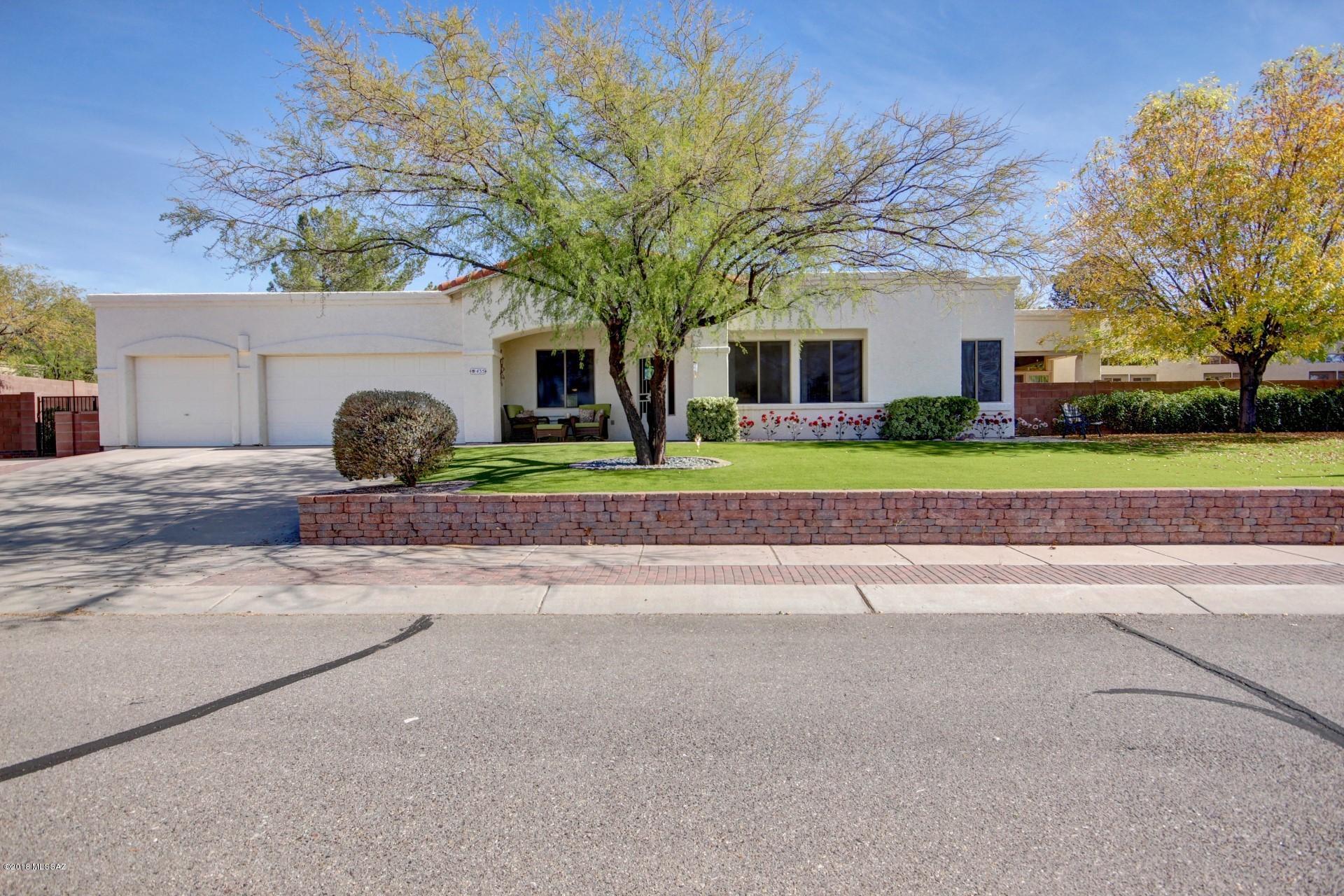 WOW!! Take a look at this amazing property!! This home is perfect for the family with its large and open floor plan. Every update you can image is here including an indoor pool, Putting green, Game room, Exercise room and workshop. This is the property you have been looking for. Breathtaking views of Kitt Peak and low care landscape all tucked away on the end of a tranquil cul-de-sac . Call now to schedule your showing!!