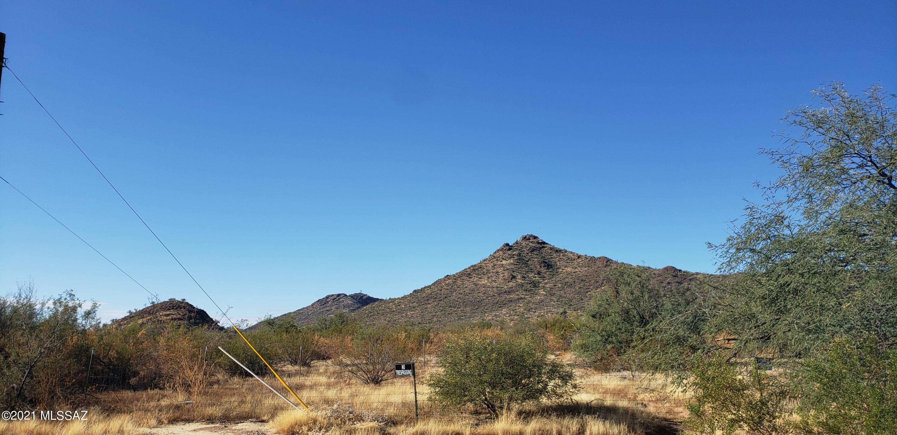 5 ACRES ready for new home, Manufactured homes welcome. Water, power and septic system available onsite. Enjoy the peace and quiet with beautiful mountain views.