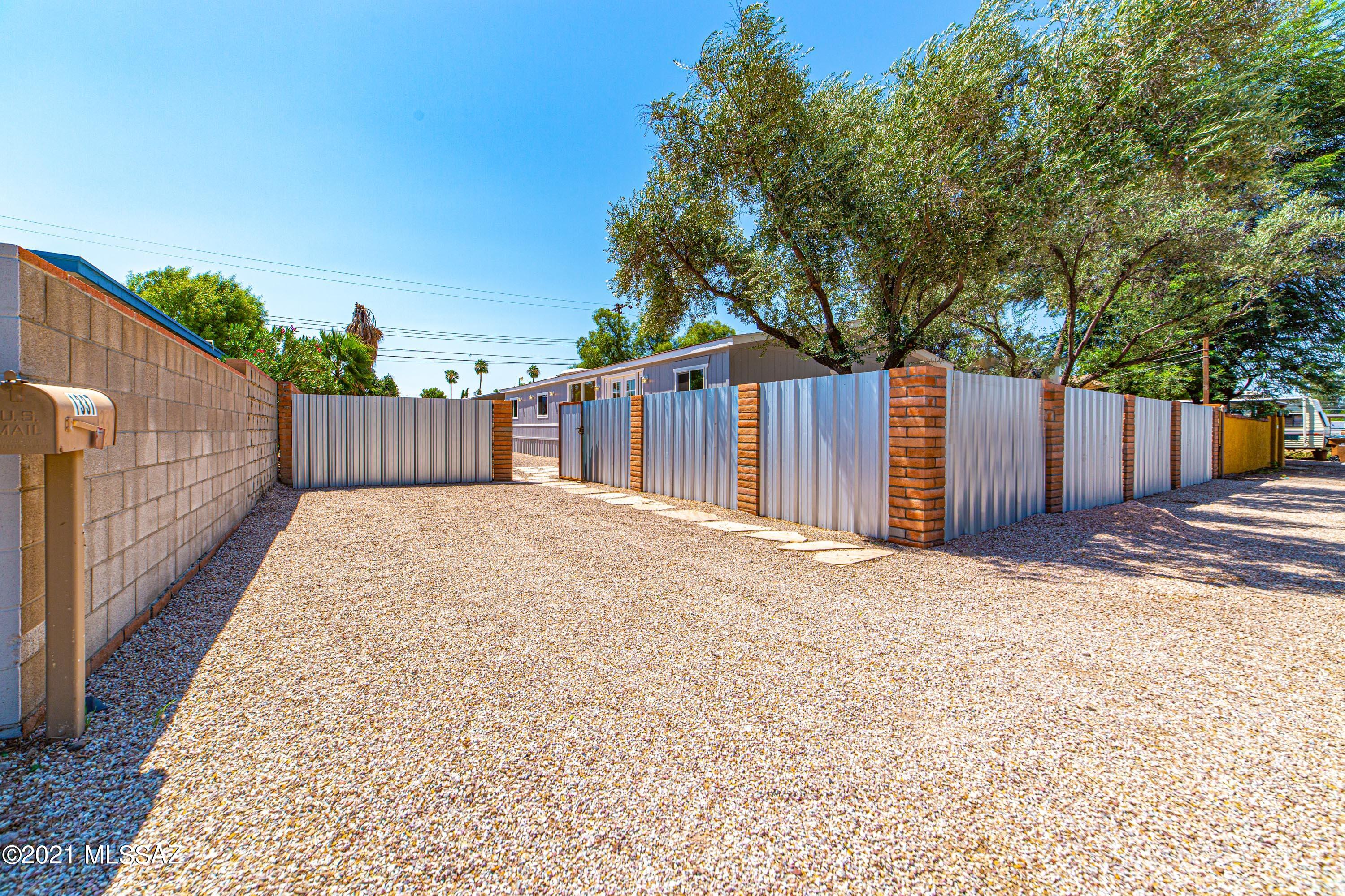 Newly remodeled manufactured home just hit the market!  This home features 4 bedrooms/2baths of spacious living!  Entertain friends & family in the beautiful great room & kitchen featuring stainless steel appliances, granite counters, plenty of cabinet space, and a large island.  Enjoy evening sunsets by the pool and spacious backyard.  Updates include new Aqua PEX plumbing throughout, tankless water heater, new interior & exterior paint. Both bathrooms have been completed renovated!  Plenty of parking available with alley access for additional parking an possible future workshop!  Close to the Riverwalk, shopping, restaurants and more. Don't miss out on this one!