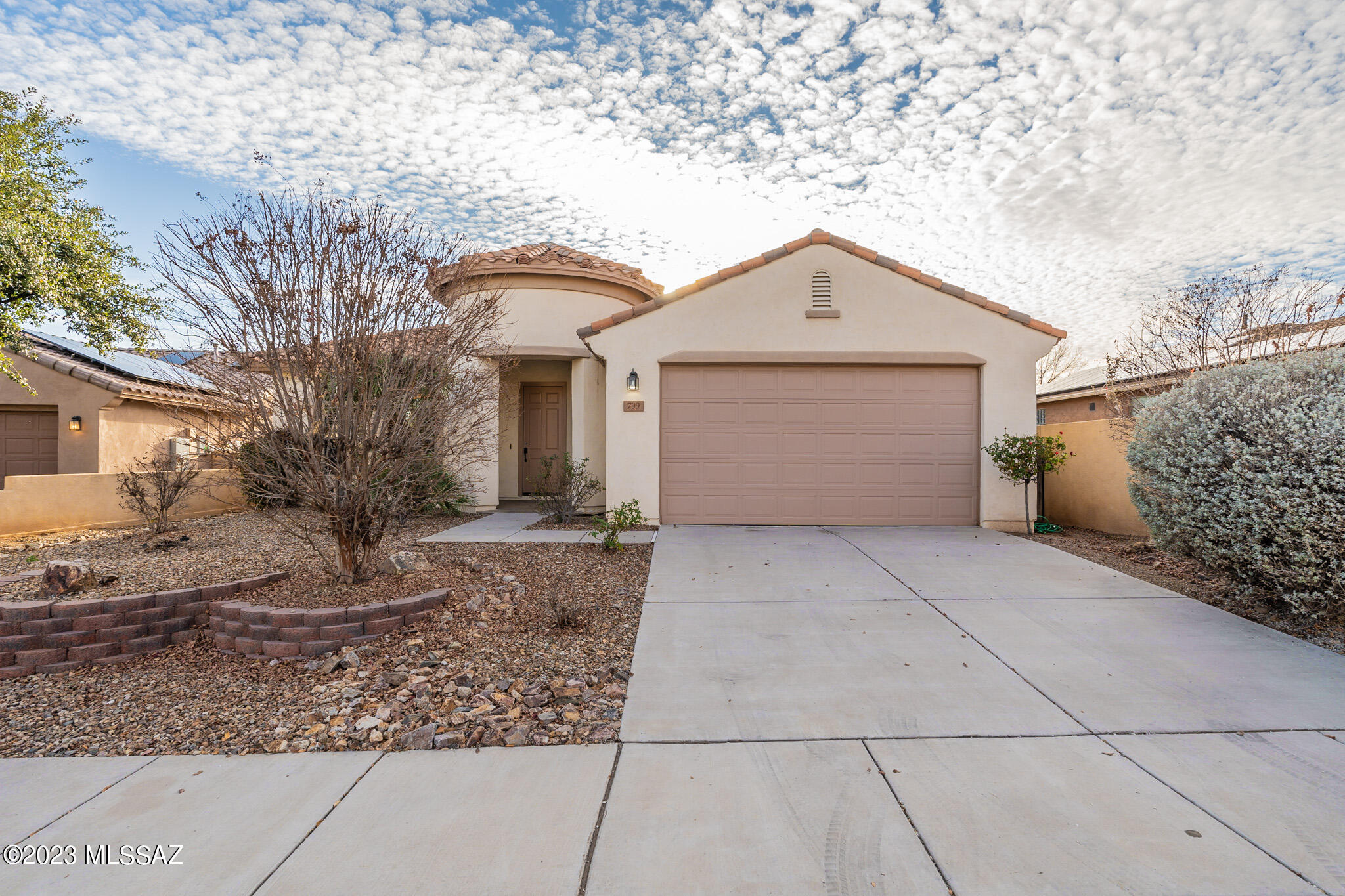 Built 2007 - 3 BED 2 BATH - 2028 sq ft gorgeous home located in a highly sought after Gated Entrada Bonita Subdivision in Rancho Sahuarita. This home boasts a great room with fireplace and an entertainment nook. Formal dining area, kitchen island with separate dining area off of kitchen. Stainless steel appliances. Appliances included: refrigerator, gas oven/stove, built in microwave, dishwasher, washer/dryer. Large master suite with custom walk in shower and custom master closet. Covered patio extends to a large finished back yard including pavers, sitting area, trees and shrubs. Situated in a friendly Master Plan Community with A+ school system Anza Trail School District. Community includes trails, gym, clubhouse, dog parks, splash pads, pool and even a water park. Tenants have access to all of Rancho Sahuarita Community amenities including the clubhouse gym and pools. Tenant(s) responsible to purchase the Rancho Sahuarita Club Access Card. Pets are subject to approval. Pet rent $25/mo. per pet. SECURITY DEPOSIT $ 3,223.50.