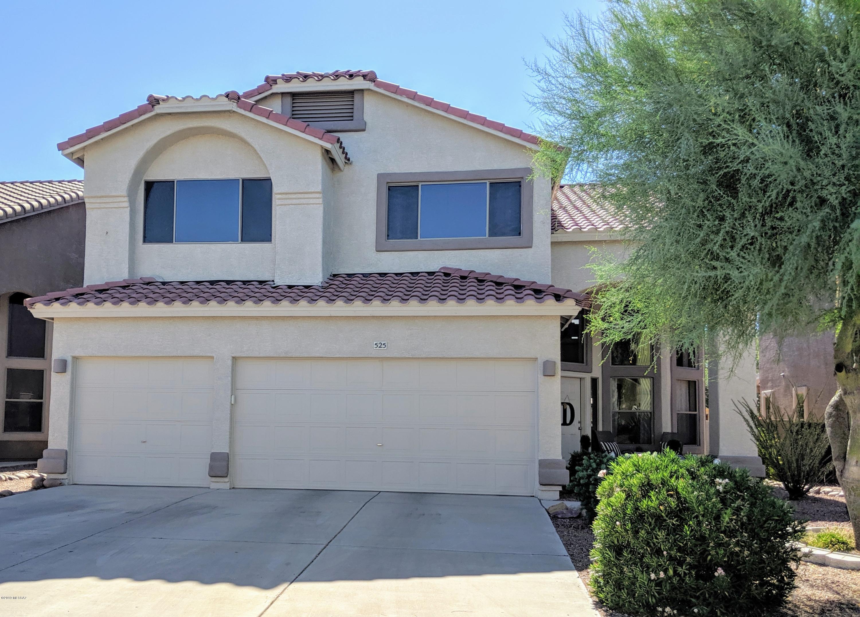 Absolutely stunning turn-key ready home for sale. Newer paint inside and out, very clean, with updated lighting fixtures and fans. 3 bedrooms, a loft and a den off the master bedroom, make this DR Horton home a popular choice. Including a 3 car garage with epoxy flooring, overhead storage, and a side pedestrian door. For added privacy, enjoy that there are no rear neighbors, and a large balcony off the master, with great mountain views. Professionally landscaped back yard with turf, pavers, and a gorgeous gazebo. Nestled in the amazing Rancho Sahuarita community, filled with beautiful parks, pools, a lake, a waterpark, clubhouse and exercise facilities. Priced to sell and won't last long. Call today to schedule your showing.