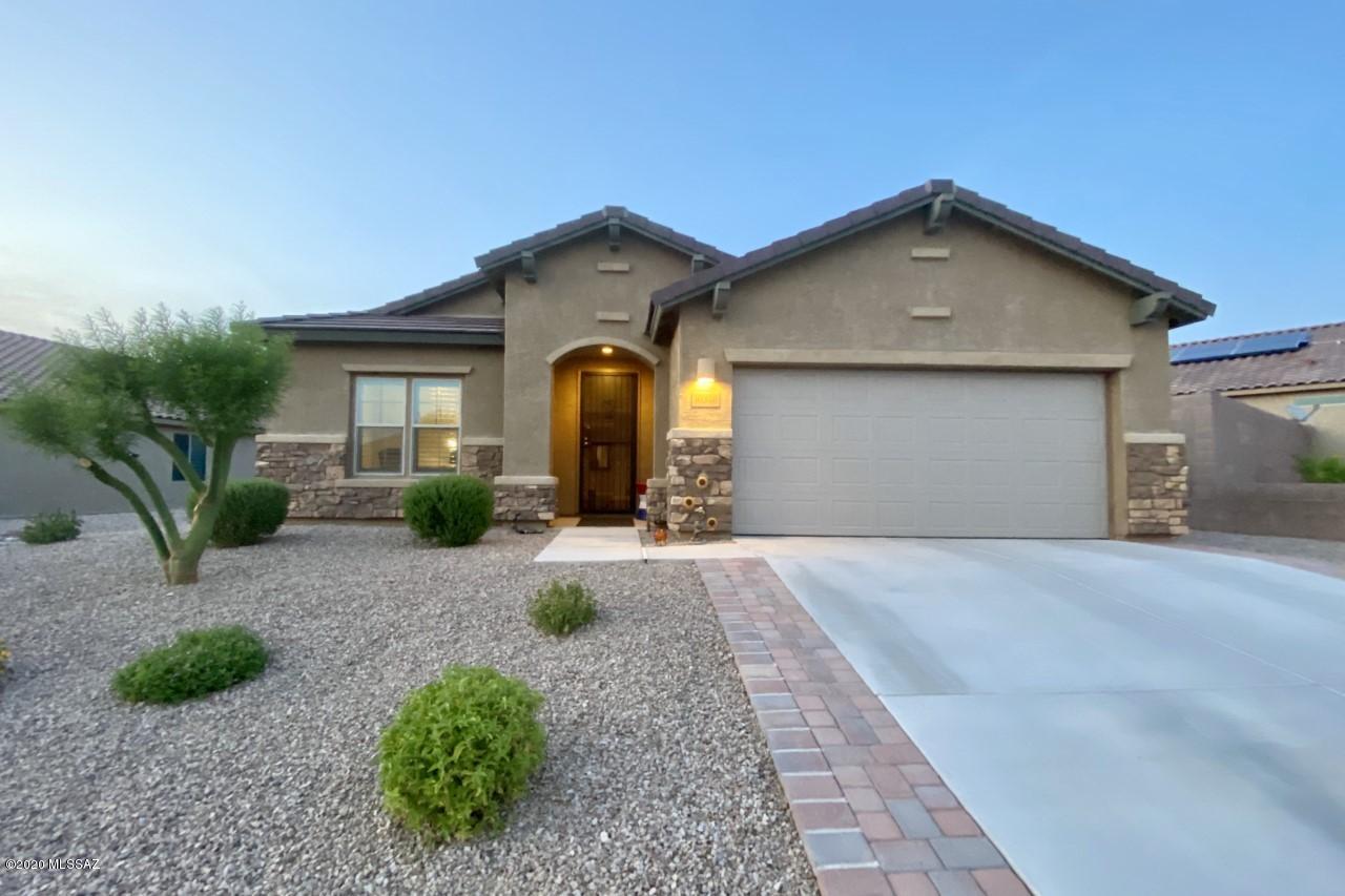 This like new 1981 SF home, built in 2017, features two bedrooms, a den, two bathrooms, 2.5 car garage, enclosed AZ room with fireplace, PAID off solar (electric bill is $20/month), gorgeous kitchen with gas range, center island, granite, walk-in pantry, and more!

North facing covered patio. Community amenities include 2 pools, spa, tennis, pickleball, bocce ball, billiards, recreation center, fitness center, putting green, demo kitchen, The Lodge, jogging path, new park & much more! Come. See. Stay!