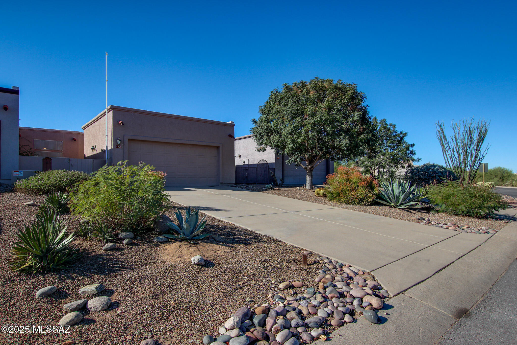 Move-in ready townhome located in sought-after Green Valley adult community!
This well-maintained home has been refreshed throughout with plush new carpet, updated lighting/electrical and plumbing fixtures, fresh interior paint, and stainless steel appliances. The exterior was thoughtfully refreshed as well, with cleaned and updated landscaping and decorative rock for excellent curb appeal. Step outside to your own private backyard retreat, surrounded by lush greenery and trees. Enjoy outdoor living year-round under the covered patio, plus an additional vented soft-canopy gazebo for relaxation or entertaining. As a resident, you'll also enjoy full access to Green Valley Recreation amenities, offering countless opportunities for activity, connection, and leisure. This one is a must see