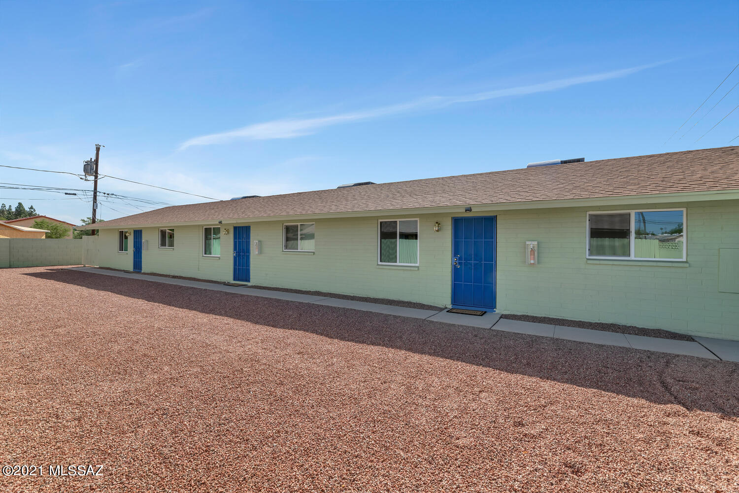 Nicely kept all 2 bedroom Triplex, One tenant in place w/M-T-M lease.  Two vacant on LB but all have been redone.  New Roofs, New Dual Pane Windows-Did I forget the new landscaping, and NEW AIR CONIDTIONERS as well as Quartz Countertops.  Private rear yards and gated entry.  Owner owned Laundry for additional Income~Buyer to verify all facts and figures,
