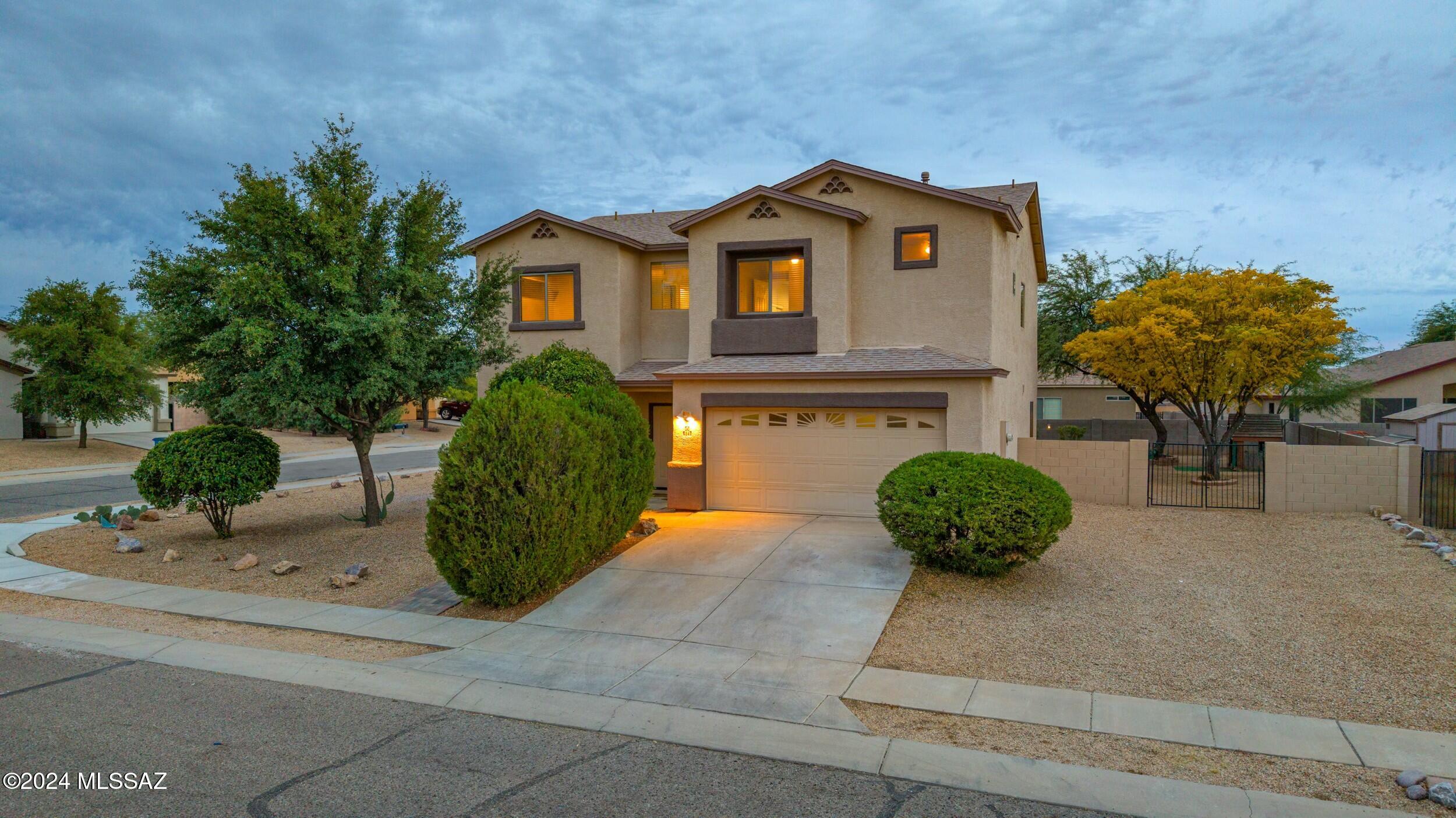 Welcome to this meticulously maintained, two-story home nestled on a large corner lot. Boasting 5 spacious bedrooms and 3.5 bathrooms. A thoughtfully designed layout with one bedroom conveniently located on the main floor, ideal for guests or multi-generational living. This residence offers ample space for growing families or those who love to entertain. This home combines comfort, convenience, and elegance in an ideal location. Don't miss out on the chance to make this your dream home!