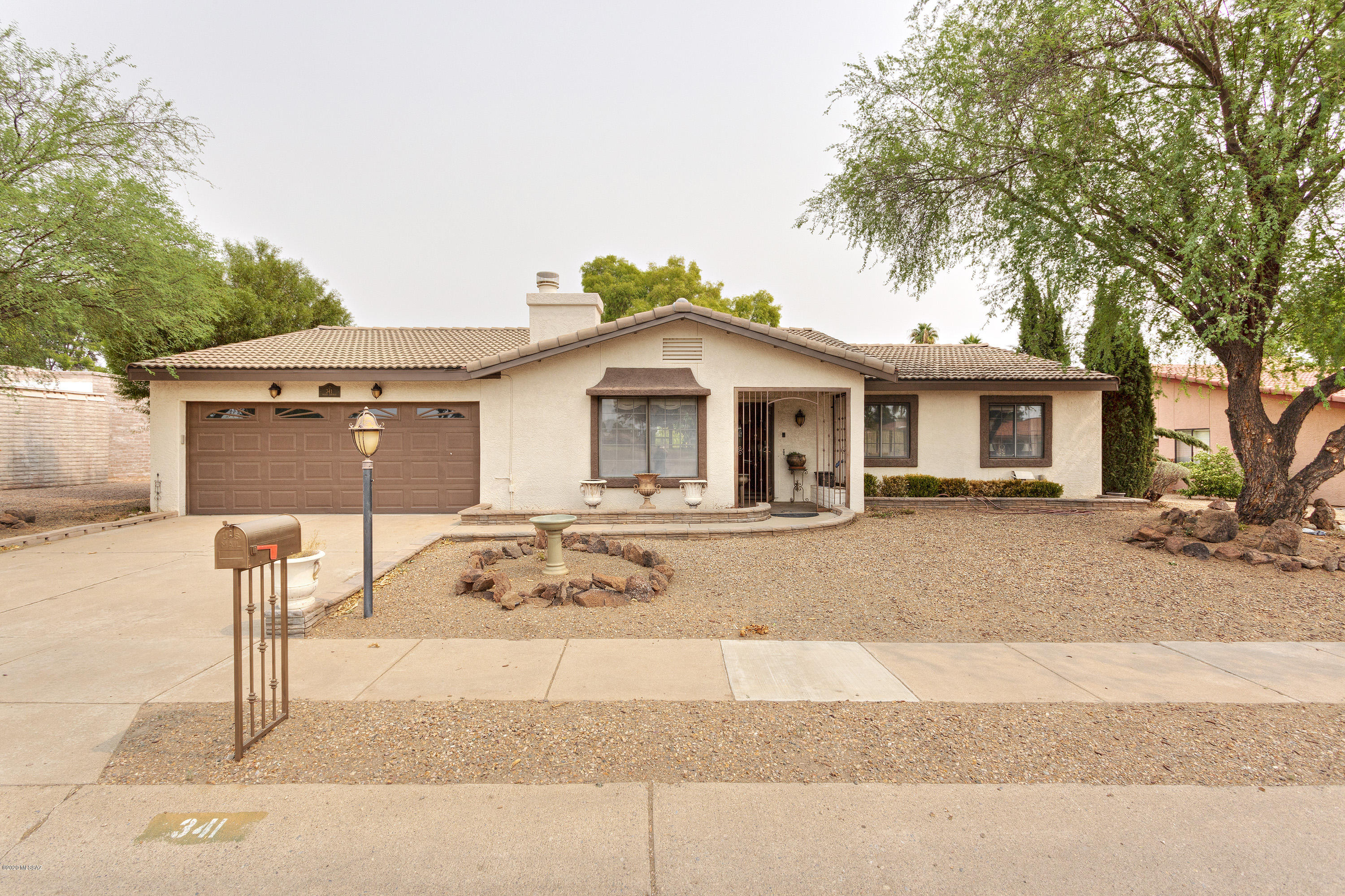 Don't miss out on this incredible opportunity to have a golf course home with golf in front and back! A pool makes this home that much more of a rare find. Remodeled kitchen, scraped popcorn in several areas of the home, skylights in the kitchen, a formal dining area, and kitchen sink window are just a few of the features you will love. This home has been well maintained and is ready for you to move in. Low HOA fee and GVR are another plus. GVR center and a second golf course are a short golf cart ride south from the home.