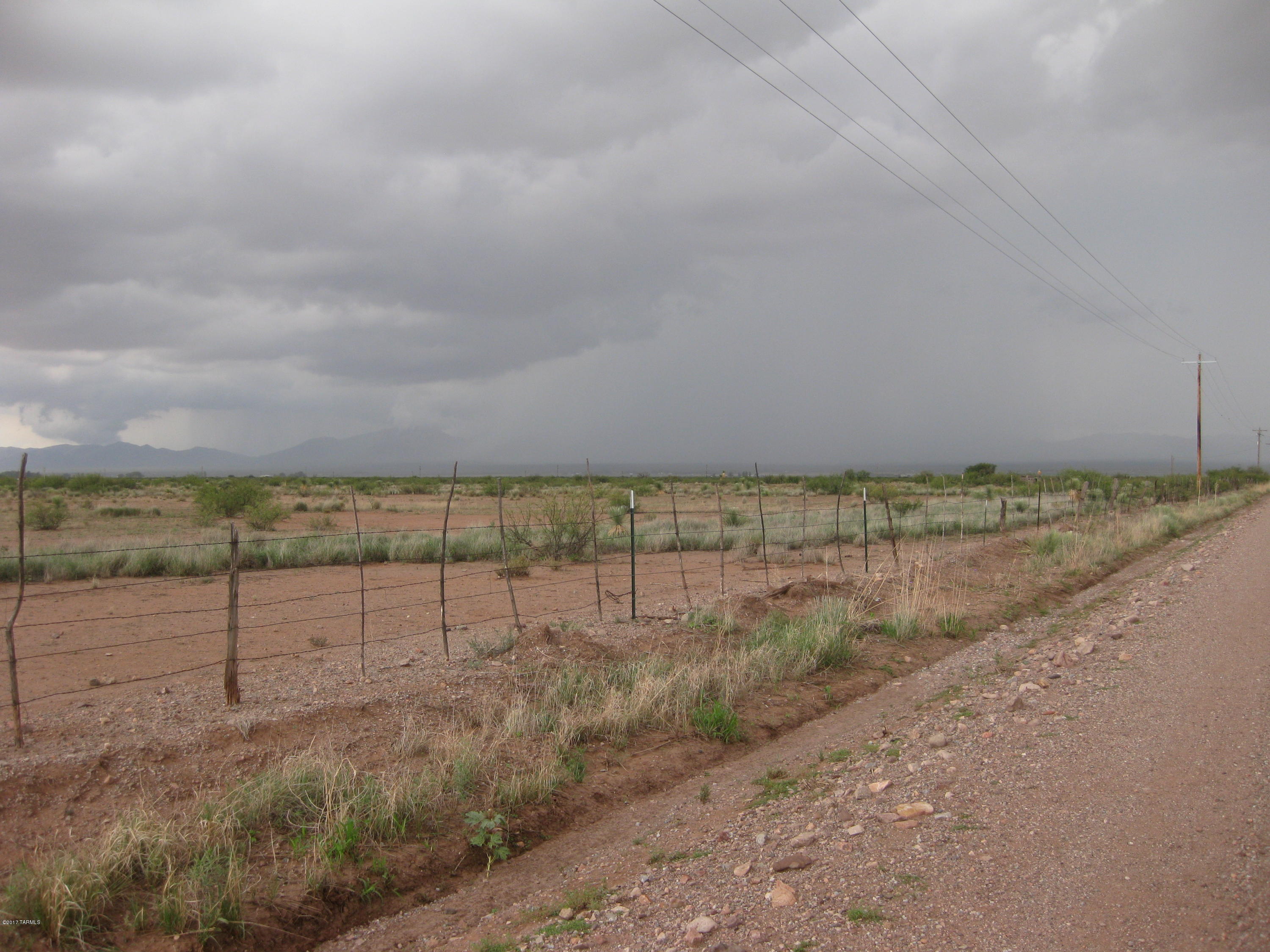 OPPORTUNITY KNOCKING--240 Acres--Great Horse Property--Very Grassy & Open--Three Phase Power Along Entire Northern Boundary--Fronts County Maintained Lee Road--Very Private Location Yet Easy Commute to Bisbee, Sierra Vista, Tombstone. Douglas--Seller Financing Available.