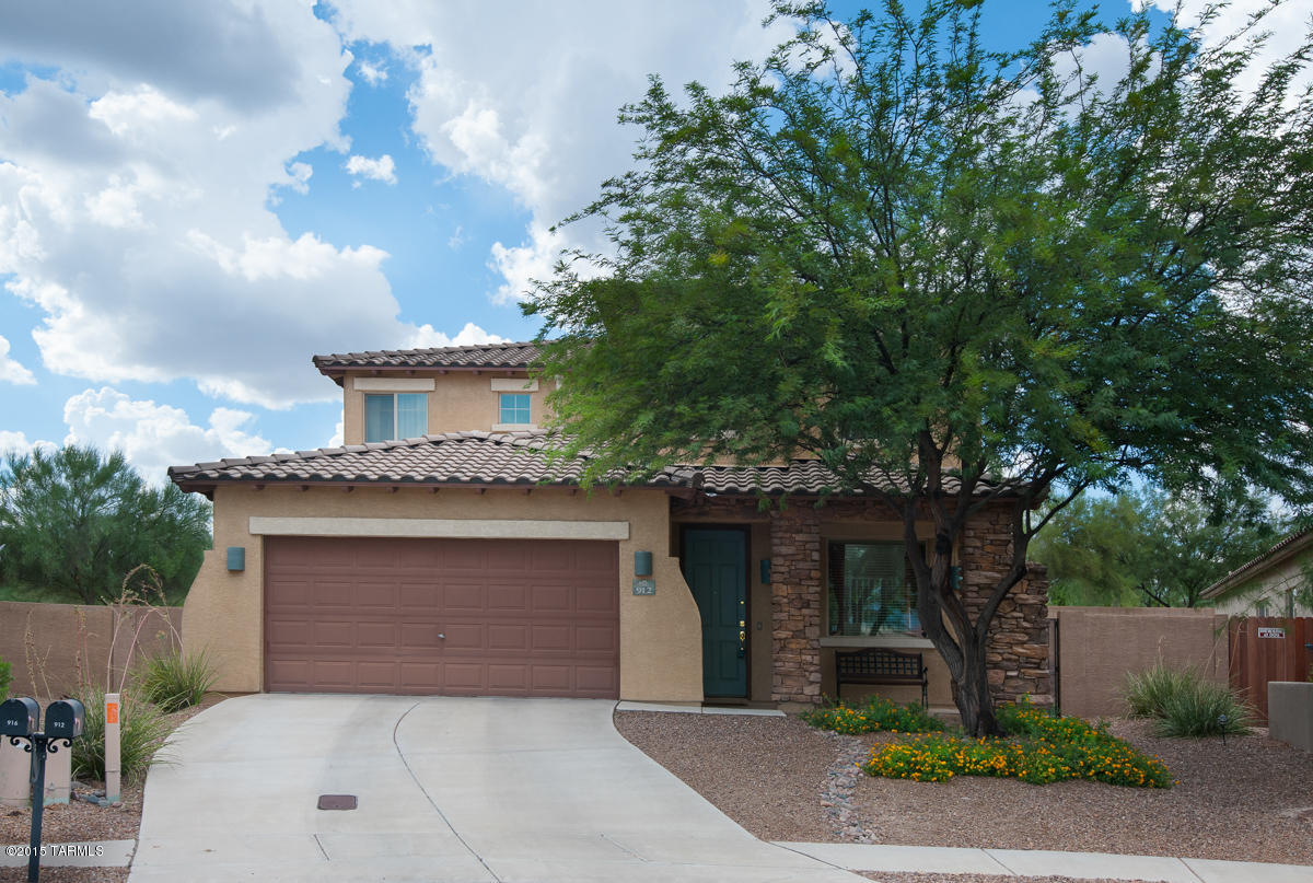 Immaculate Move-In-Ready Pulte Home on Cul-De-SacWith Largest lot in the Heart of Oro Valley! Terrific curb appeal w/ inviting walk way leading  to the stone entry way that opens to a grand scale formal living area. A beautiful Southwest Contemporary offers soaring ceilings as high as 22’, window walls further  enhance the natural light and wonderful mountain view setting. This open concept living space starts w/ a 4 bedroom, 3 bath, w/ over 2,750 sqft. featuring multiple entry & exit points, a circular flowing staircase leading up to observation/loft area & bedrooms. A gourmet kitchen will inspire your inner chef w/ its center island prep area, large pantry, modern appliances, extended cherry cabinets w/ crown molding. $5000 flooring allowance with acceptable offer.
