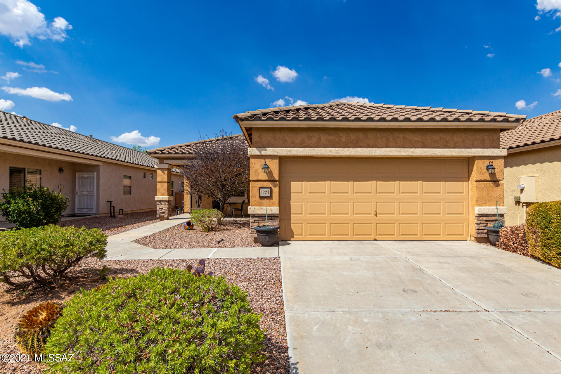 Amazing single-level with exquisite curb appeal, manicured landscape, and a 2 car garage is the house you have been looking for! Interior boasts a spacious living room, neutral palette, tile flooring, open den ideal for an office or formal dining, and ceiling fans. The eat-in kitchen is equipped with ample oak cabinets, plenty of counter space, and essential appliances. The main bedroom has bay window, walk-in closet, and its own bathroom w/dual vanity. Delightful backyard offers covered patio, paver seating areas, and a cozy fireplace to enjoy chilly nights while contemplating the stars. Do not miss this amazing value!