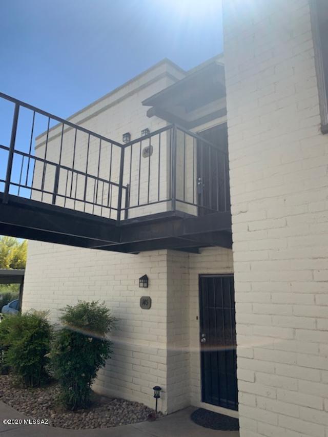 Beautiful East side Condo. This move in ready condo has New A/C unit, stainless appliances, bright and light second level unit. The Covered parking is located right below the condo, you can see your covered parking from the front door.  Convenient location with Jesse Owens park, Camino Seco Village, Pantano wash trail, grocery stores, all very close. HOA covers water, sewer, trash, hot water, roof and community amenities. Large bedroom with spacious closet, Bright kitchen, cozy patio and perfect location within the property. Beautiful well kept community pool located very close to condo. This condo is a must see!