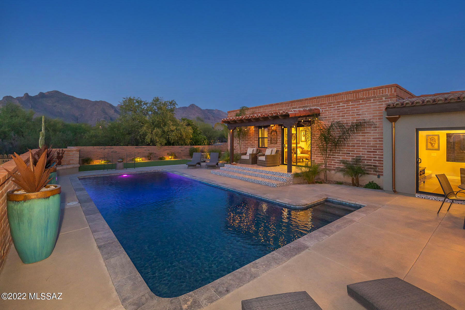 Stunning and modern meets the charm of Foothills tradition.  This spectacular burnt adobe estate on 1.3 acres has been expertly renovated with meticulous attention to detail and quality with no expense spared! The home is complete with designer finishes that transport you into modern luxury while maintaining the character of the original burnt adobe architecture.  This sprawling home offers 3,606 SF of premium living space with a sleek designer kitchen, 4bed/4bath, and tons of storage in a 2,000 SF RV height 6+car garage for all of your toys!! Four different patios and gorgeous front and back yards offer breathtaking 360 degree Foothills views. Review the extensive list of tastefully considered upgrades to really appreciate what this home offers.  Welcome to Casas Adobes! Owner/Agent