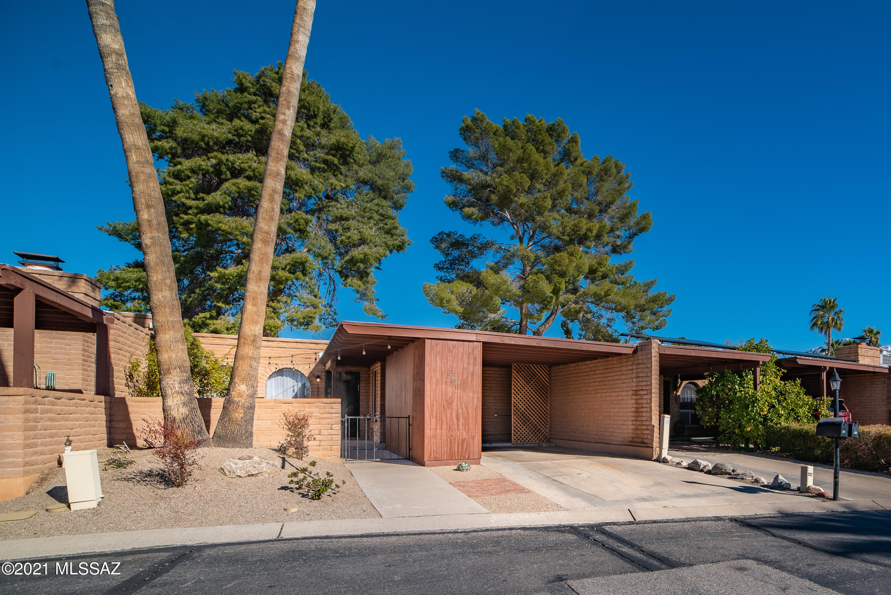 Gorgeous, lovingly remodeled townhome in the highly desirable Villa La Estella Garden Townhouse community in NW Tucson. Highlights include new tile and carpet flooring throughout, new light fixtures, custom finishes, newer AC/heating unit, freshly coated roof, and professionally designed landscaping in the front entry and back yard. This home has been meticulously maintained and loved by a growing family - An absolutely EXCEPTIONAL home!