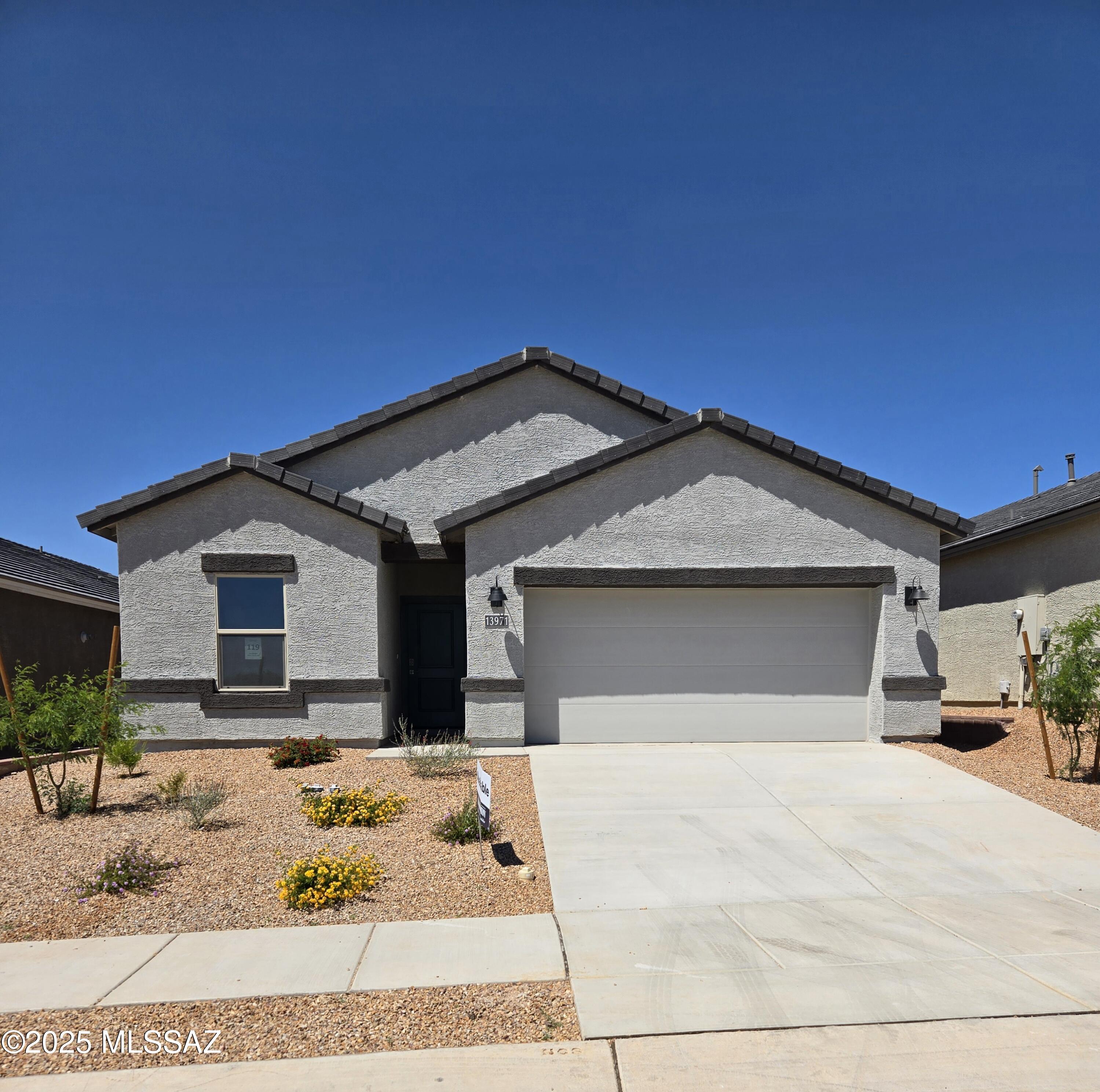 Brand-new construction and brand-new floorplan within the popular Rocking K, a master-planned community. This single-story home boasts an open concept layout that caters to comfort and style.
This home is 1856 square feet of living space. The living area is accentuated by 9 feet high ceilings. Quartz countertops in kitchen and bathroom and stainless steel appliances including a microwave, dishwasher and gas range. 
The primary suite has a large closet for ample storage and a en-suite bathroom with a double vanity. Energy efficiency is at the forefront of this home's design, boasting dual pane low-emissivity windows and ceiling fan prewires to ensure comfort year-round.  A 2-car garage provides convenient parking and additional storage space. 
Technology suite include