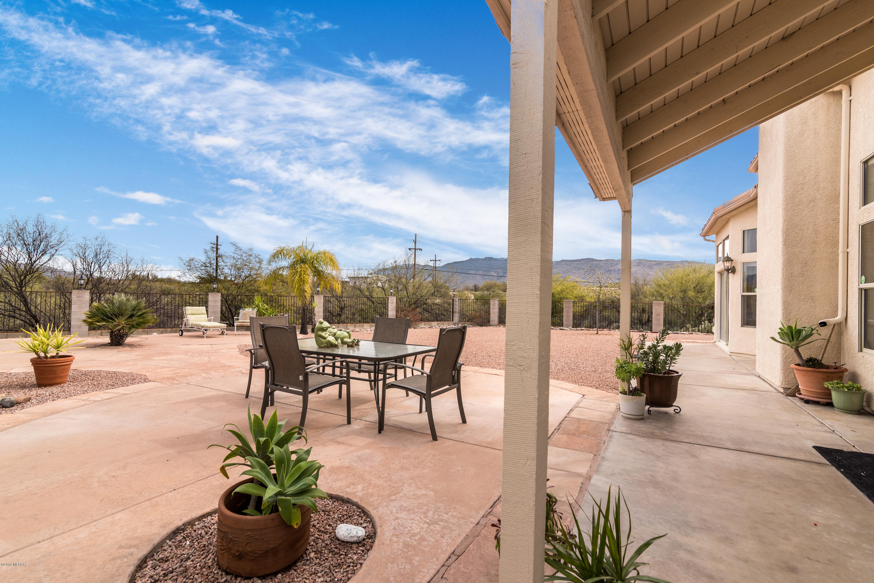 Stunning Silverado Hills beauty! Dramatic entry with grand staircase and vaulted ceilings in spacious foyer. Large great room w/ tons of windows, gas fireplace, and breakfast nook with views. Coved ceiling in formal dining, plantation shutters, room for baby grand and more! Spacious master downstairs with gorgeous mountain views from all sides. 3 bedrooms upstairs, one with en-suite bath and walk-in closet is perfect for 2nd master or guests. Large guest bedrooms, dual sinks in hall bath, and built in storage on balcony open to below. Large open kitchen with tons of cabinets and counter-space, newer stainless appliances and neutral tones. Natural open space on north and east sides of oversized private back yard. Flagstone and concrete patios and plenty of room for a pool! A must see!