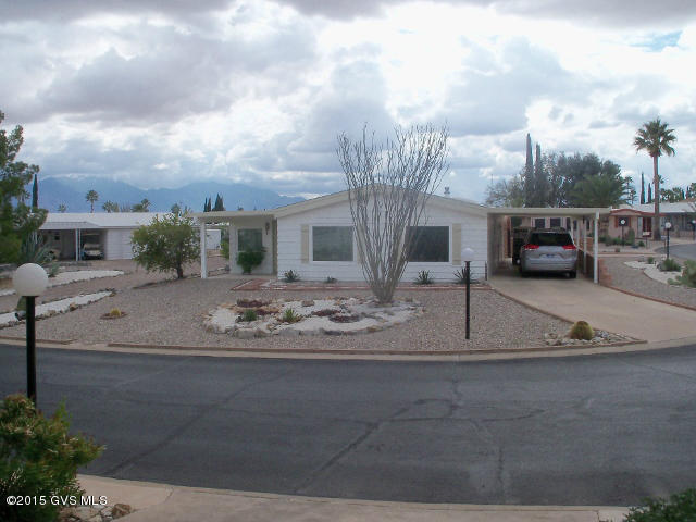 Upgraded home that shows imagination, set on one of the largest lots in Pueblo Estates. Outstanding orientation. Walled in back yard with Mountain Views. Added bonus, drive thru carport. Finished tile Arizona Room and Music/craft/office/computer/game room. New roof September 2015. Workshop/storage room. Under Termite Warranty with Bill's Home Service. American Home Shield Warranty provided to Buyers. HOA dues $50.00 mo. included trash pick up once a week. Great recreational facilities that include, heated pool and spa, library, ceramic, exercise and billiards room. Shuffle board, horse shoes, and bean bag toss. Central location to shopping,|\n|Doctors, Restaurants, House of Worship and our New Green Valley Hospital.