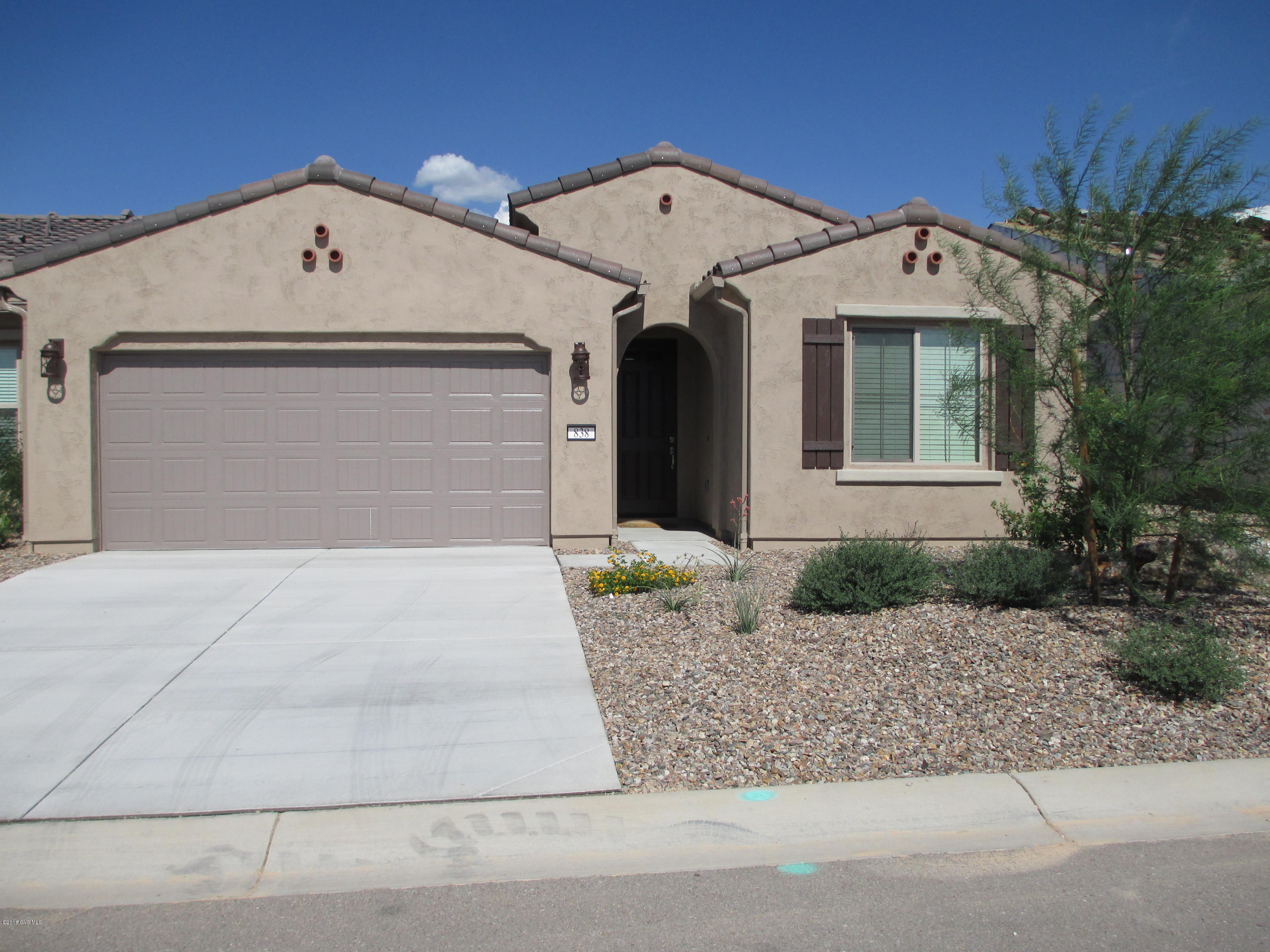 New Quail Creek Villa is now available. This villa offers a open concept floor plan with split bedrooms, 2 baths. This lock and leave concept let's you enjoy live to the fullest. Home offer's granite countertops, under cabinet lighting, granite composite sink, pull out shelving, & pantry closet. Nice window coverings are already there for you, SS refrigerator installed and water softener . Washer and Dryer stay too. All you have to do is move your own personal belongings. The new tasteful furniture is available SBOS. Large floor tile, carpet in bedrooms. Covered patio was also extended for your enjoyment. The back offers an southeast view of the Santa Rita's. There wasn't an upgrade missed in this home. This is a must see.