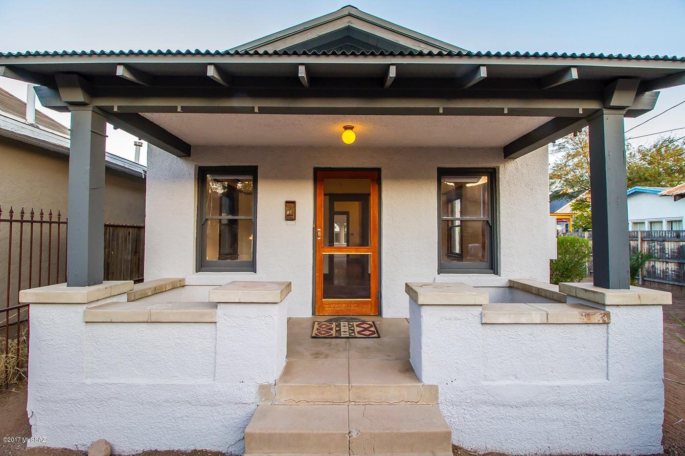 This is the Deluxe Grand Mansion of Tiny Homes!!!! 1925 Historic Bungalow in the heart of Armory Park. corrugated metal roof. Off street parking if you desire and a rustic corrugated garage workshop or art studio. Terrific open kitchen.  High Ceilings with brand new high efficiency Mini split heating and cooling.