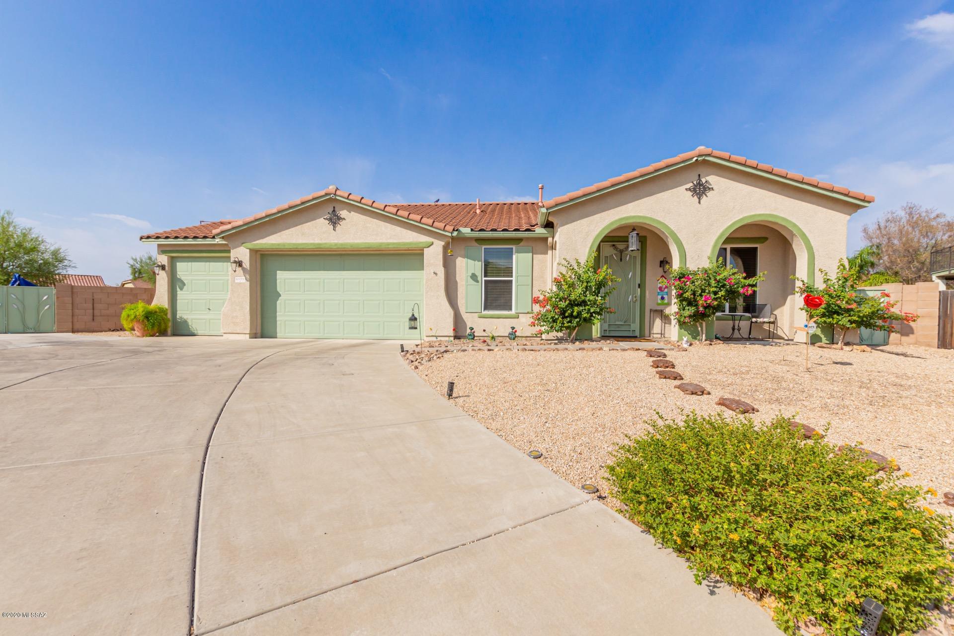 Pristine Energy Efficient Solar Home!** 3 Car garage, large backyard w/a sparkling pool, lush high-grade synthetic turf landscape, roll down shades, & covered patio w/an extended slab/patio. Custom wood storage shed. Owner will leave the wooden playhouse/swing set. Custom wrought iron front door, beautiful tiled floor, soothing palette, upgraded ceiling fans, wood blinds, & spacious family room for entertaining w/patio access. Stylish kitchen counters, large center island, breakfast bar, pantry, SS appliances w/newer microwave/dishwasher, & plethora of wood cabinets. Perfect gathering place for family & friends. Plush carpet in all bedrooms, ample closets, laundry room w/storage cabinets, &  2 pristine baths. Easy access to I-10.  Take a tour & stop renting! Listing agent related to seller