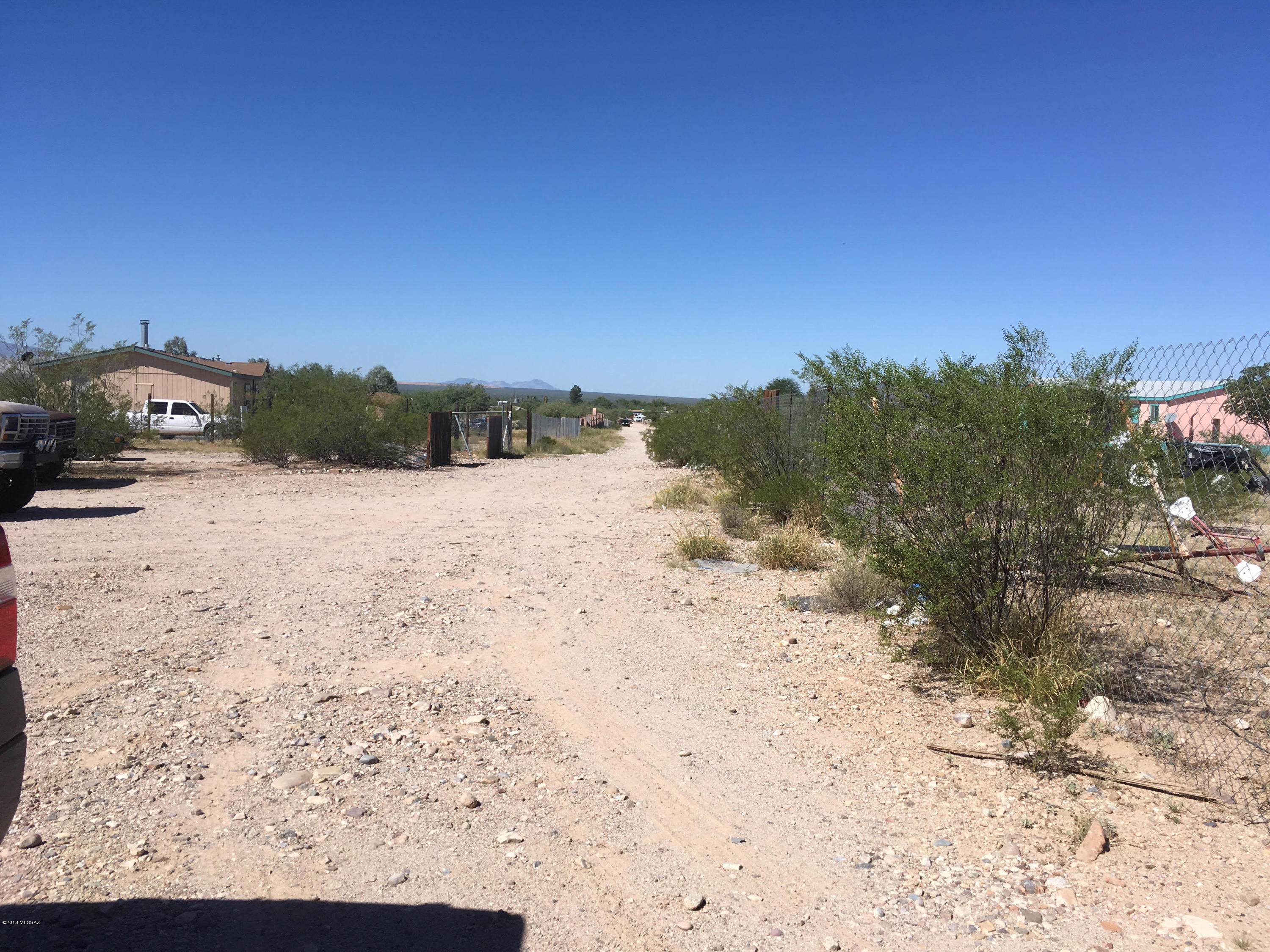 Roadway is easement across the north of this lot - not cut in.  Summit Peak Ln takes you to NW corner - Utilities at the NW corner - ready to build - nice quiet location