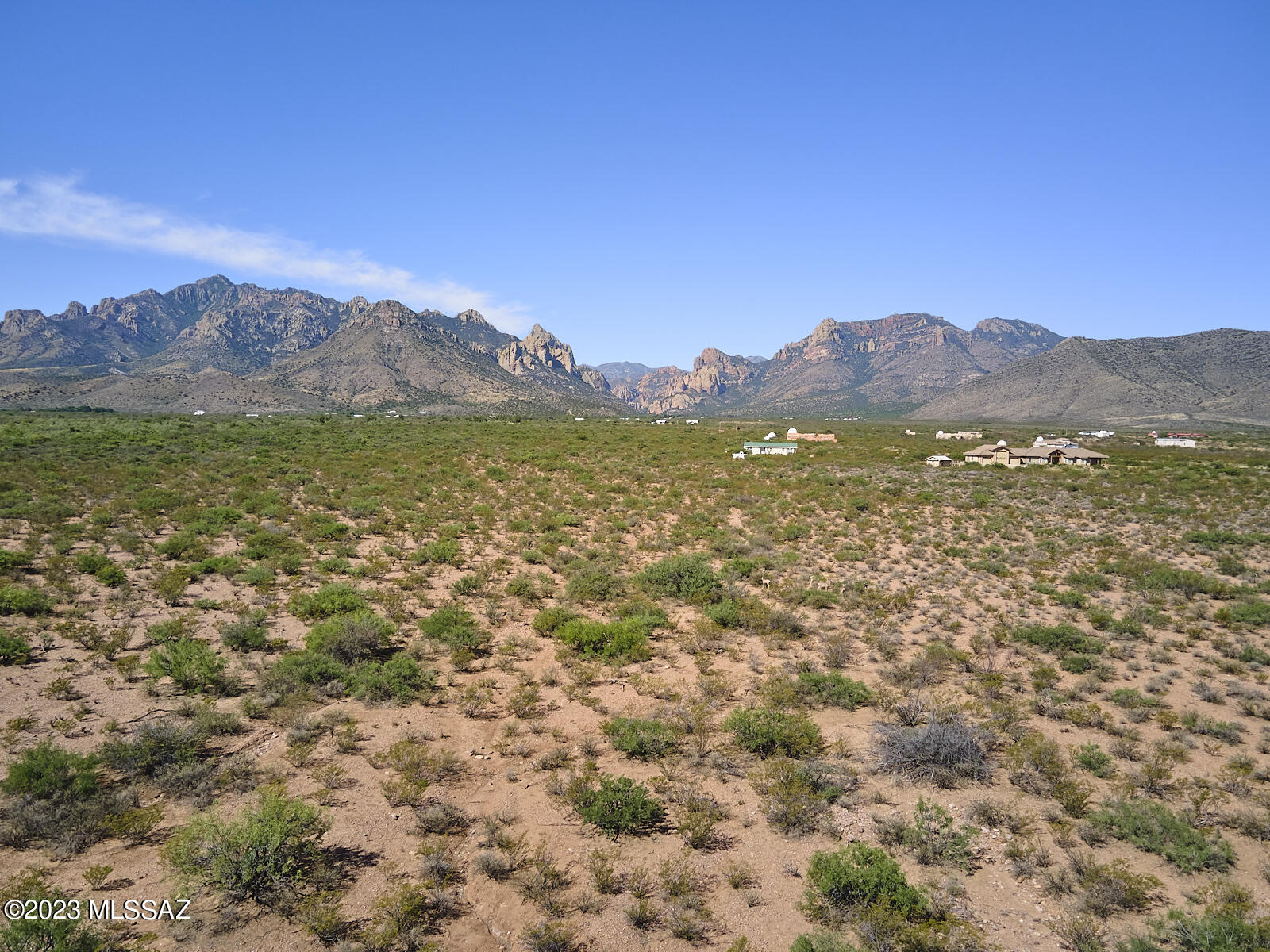 Prime location for new home construction or manufactured home. Located east of the Arizona Sky Village astronomy community. This lot is 5.01 Acres, electric available at NW Corner of Lot 005A (Approx 700 Ft away). Sought after view of the entrance to Cave Creek Canyon - jewel of South Eastern AZ. Short car ride to Rodeo, NM or Portal for access to clinic, dining, museums, art gallery, lodging, library, and post offices. Buyer to bring well into lot, Drill well, install septic. Improved road exists on north and west border of parcel. No HOA. No deed restrictions. Our region is known worldwide for birding, hiking, dark night skies, and biodiversity. Consider purchase of Parcel to the north for 10 acres in lovely Portal Arizona.