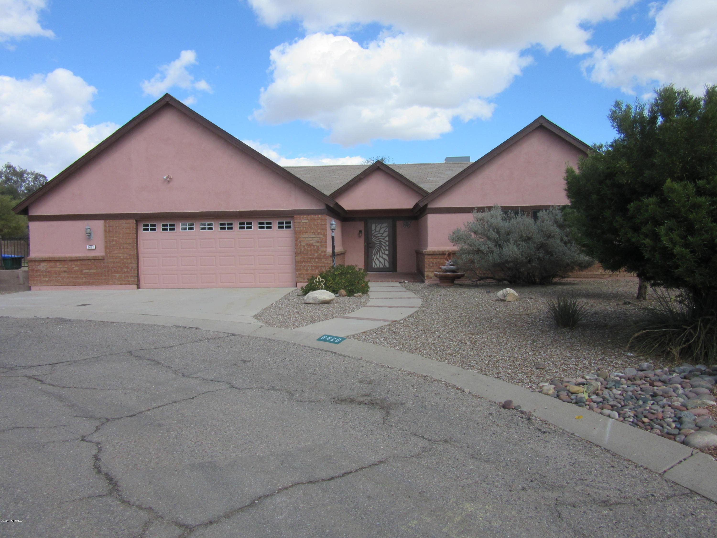 This is a great find, super property, massive lot, walled and fenced, storage, 30+-Saguaro, lots of trees, cleared lot. Fully remodeled home very nicely done, big kitchen, master, living areas, 60 foot covered patio, Granite, stainless, 18 inch tile, super clean, no kids or pets, 4 Bedrooms plus office, No HOA., RV OK