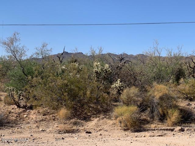 Gorgeous 5 acre corner lot with mountain views located on the edge of the Dove Mountain Community. All utilities are at the lot line for an easy build on multiple sites. Shared well has only 3 users and is located on the neighboring property. No HOA, No deed restrictions and horses are allowed.